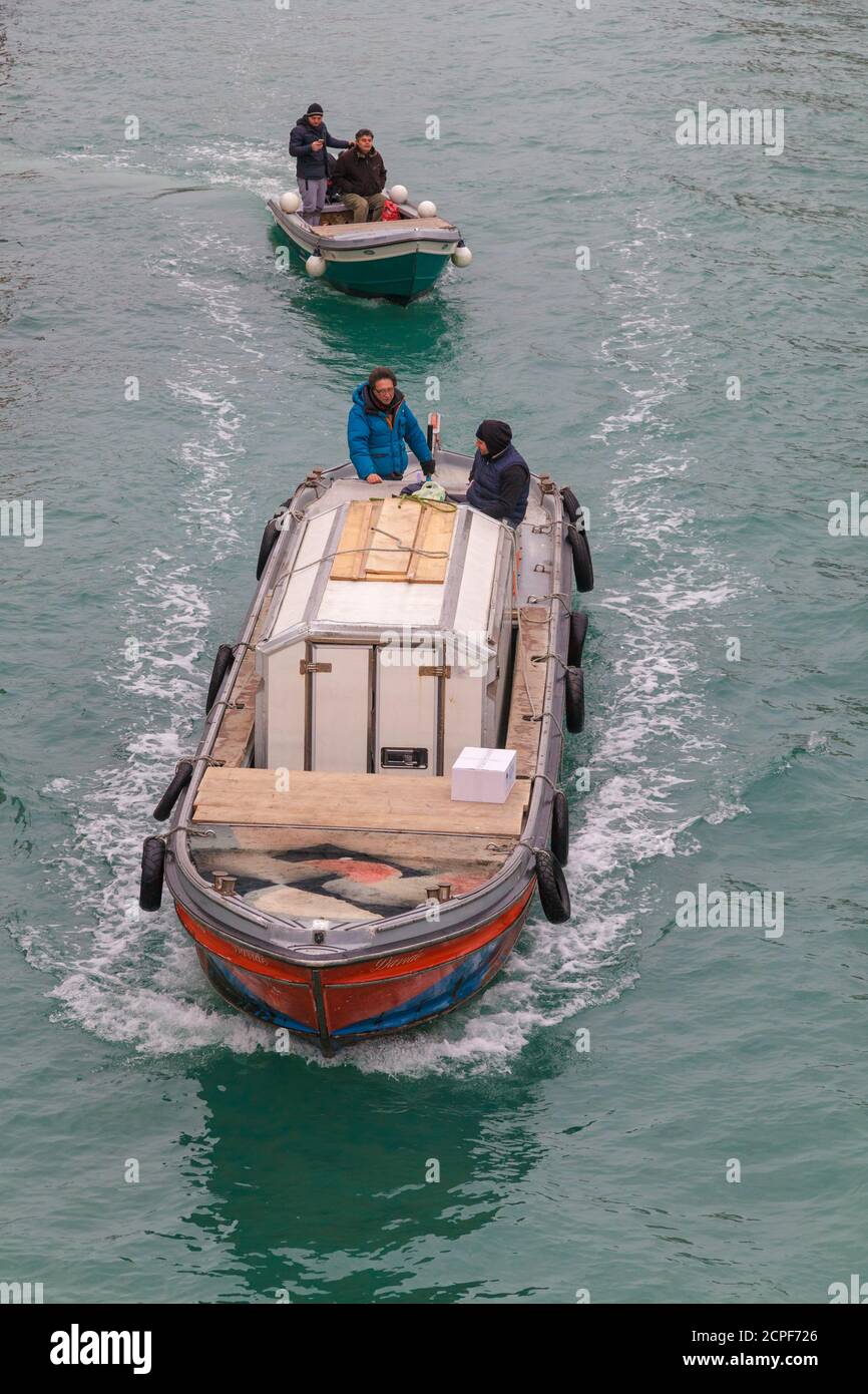 Europe, Italy, Veneto, Venice. Shipping Boats on the Ganal Grande Stock Photo