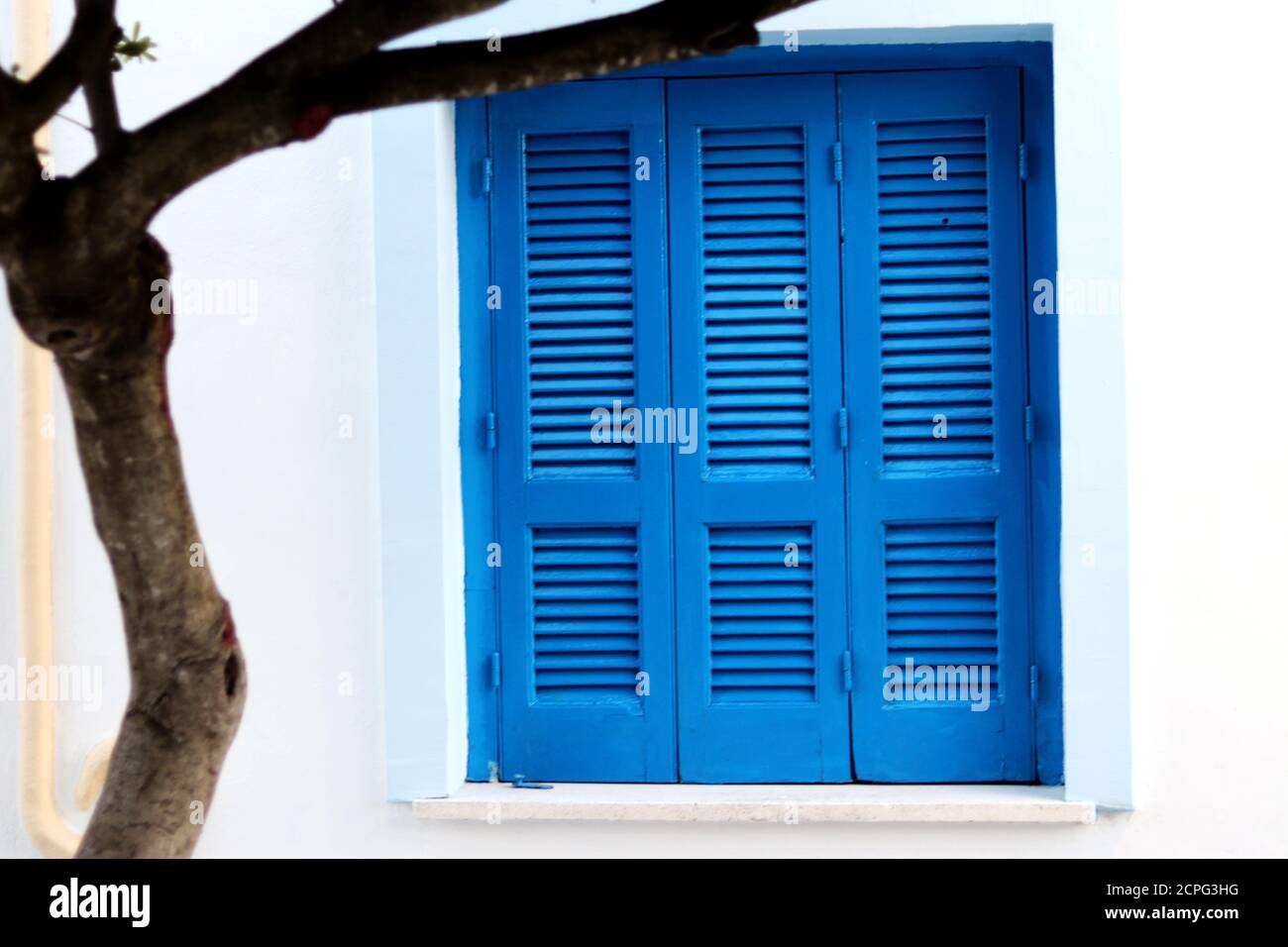 Typical greek blue window shutters Stock Photo Alamy