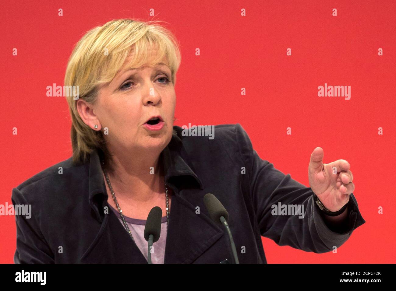 North Rhine-Westphalia State Premier and leading member of the Social Democratic Party (SPD) Hannelore Kraft speaks during a SPD party congress in Leipzig, November 14, 2013.  REUTERS/Thomas Peter (GERMANY - Tags: POLITICS) Stock Photo