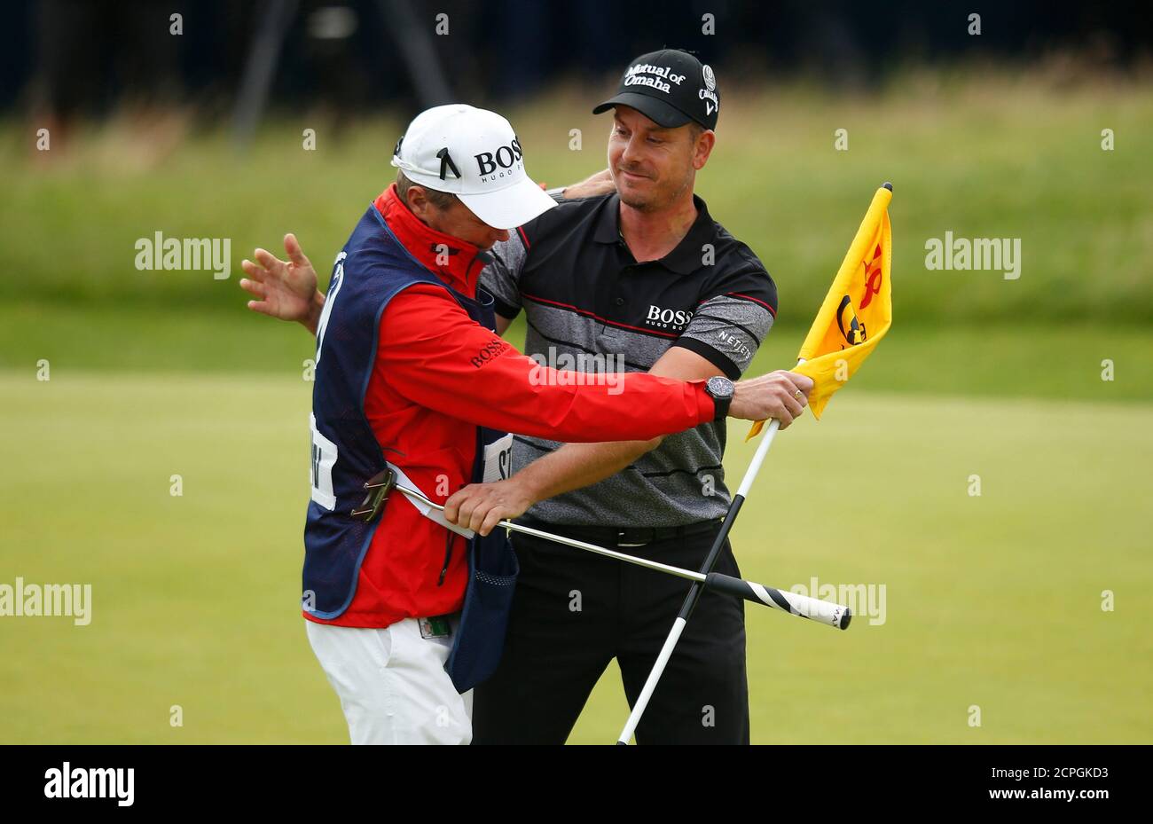 Sweden's Henrik Stenson celebrates with his caddie Gareth Lord after holing  a birdie putt on the 18th green to win the British Open golf championship  at Royal Troon, Scotland, Britain - 17/07/2016.