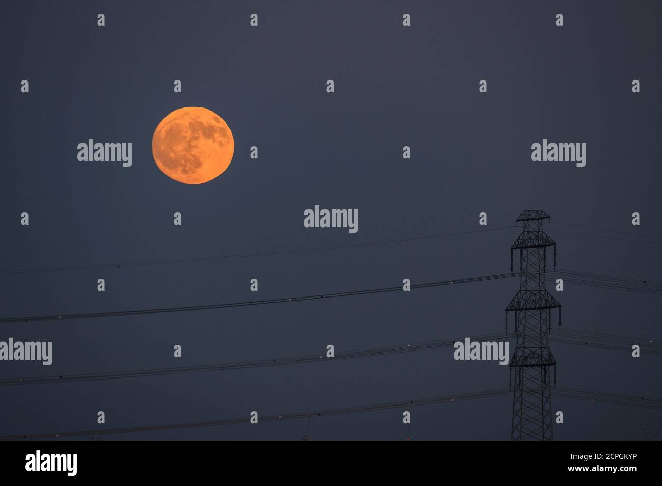 Power pole with full moon, Marchfeld, Groß-Enzersdorf, Lower Austria, Austria, Europe Stock Photo