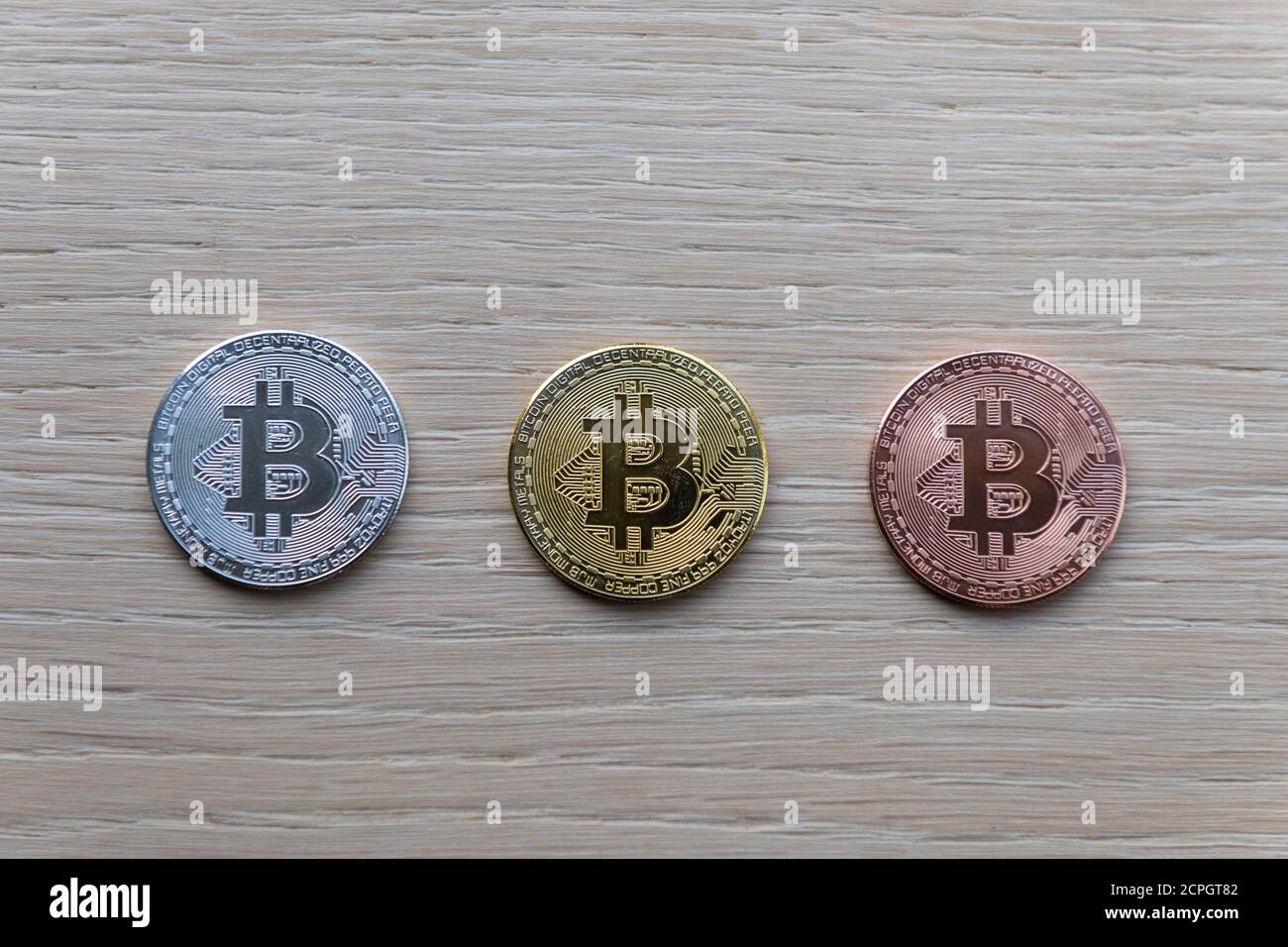 Symbol image digital currency, physical coin Bitcoin, silver, gold, bronze Stock Photo