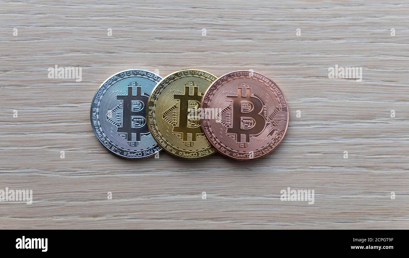 Symbol image digital currency, physical coin Bitcoin, silver, gold, bronze Stock Photo