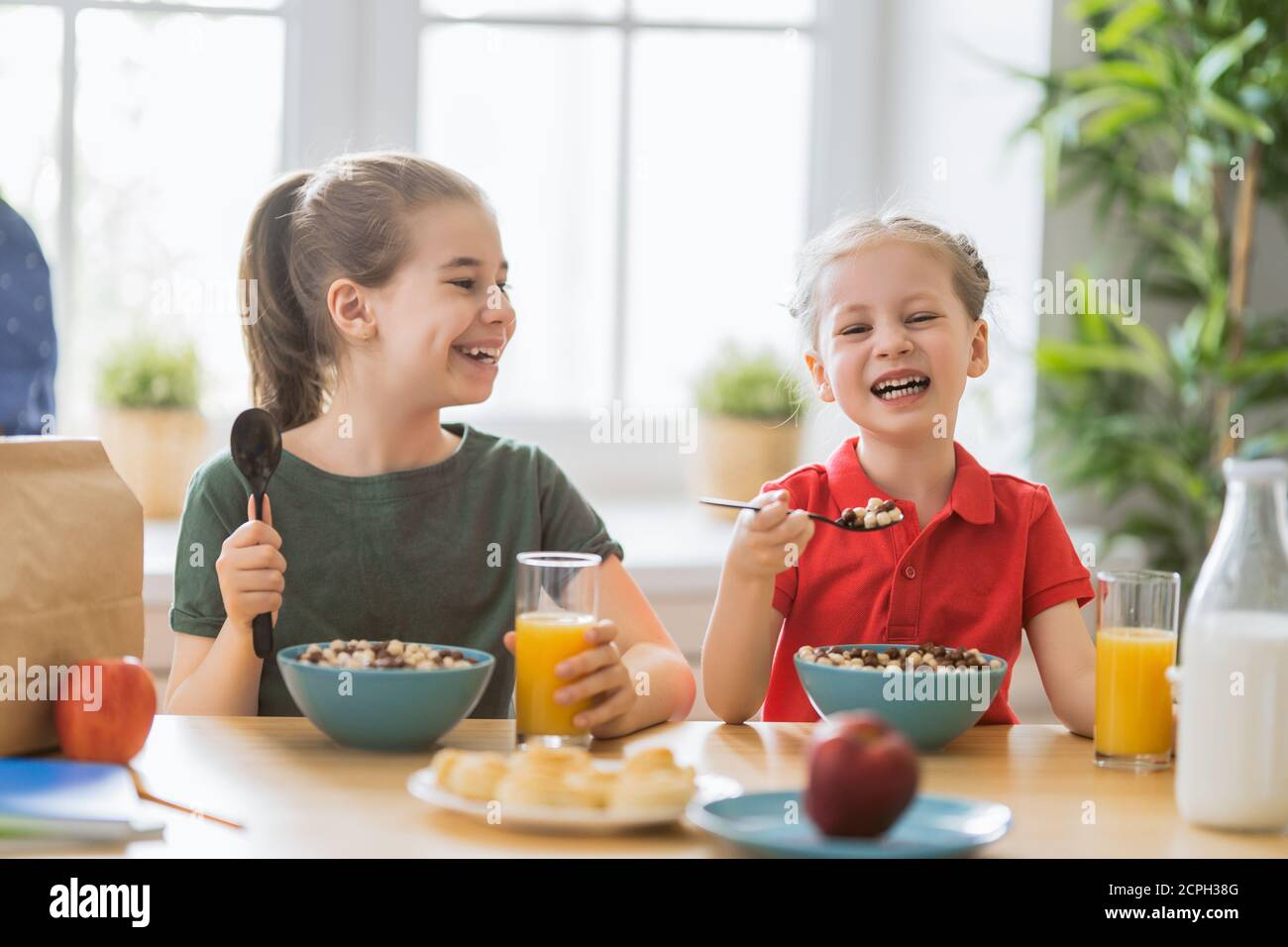 Group Of Kids Eating Cereal