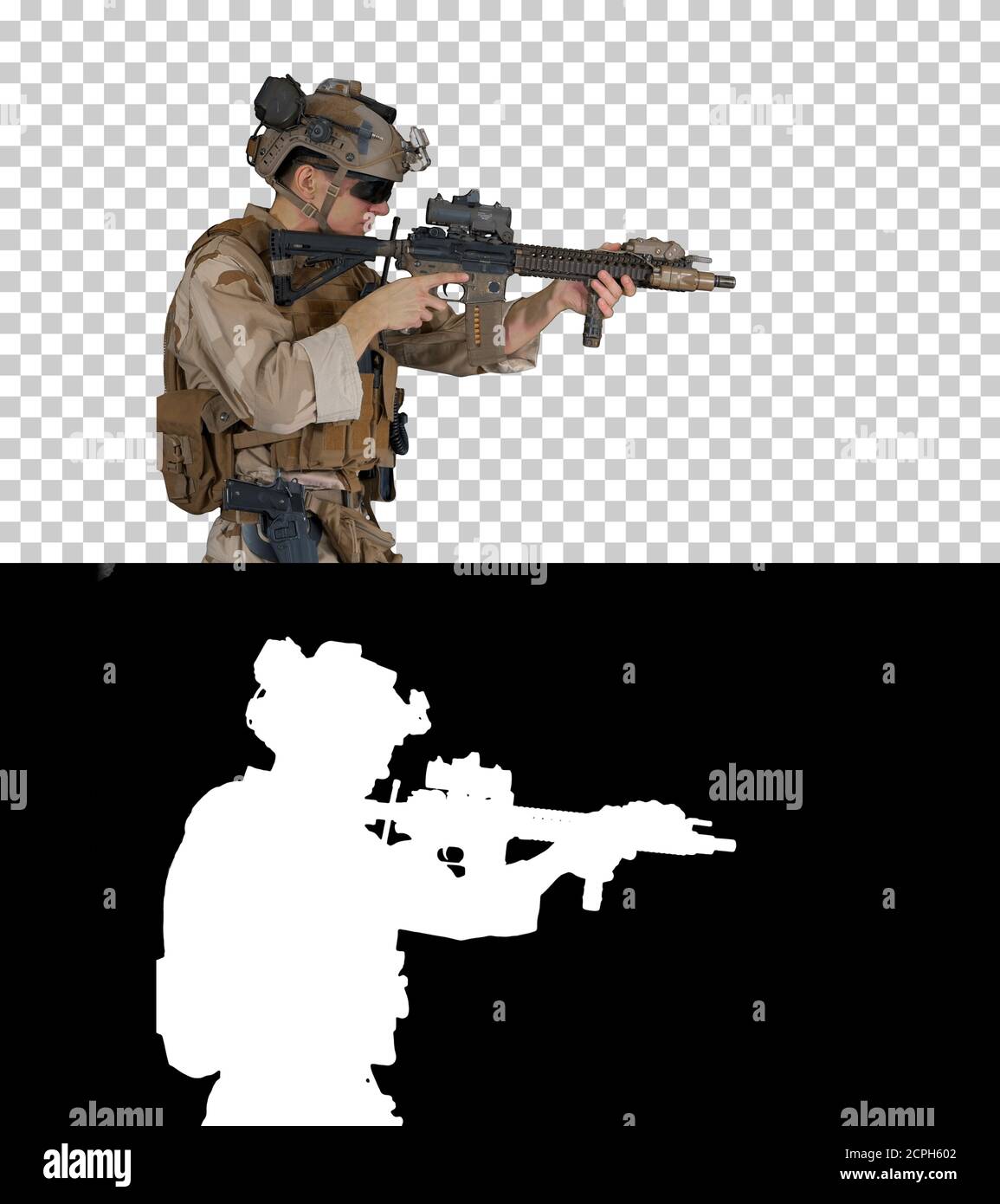 Soldier changing clip with bullets on automatic rifle while walk Stock Photo