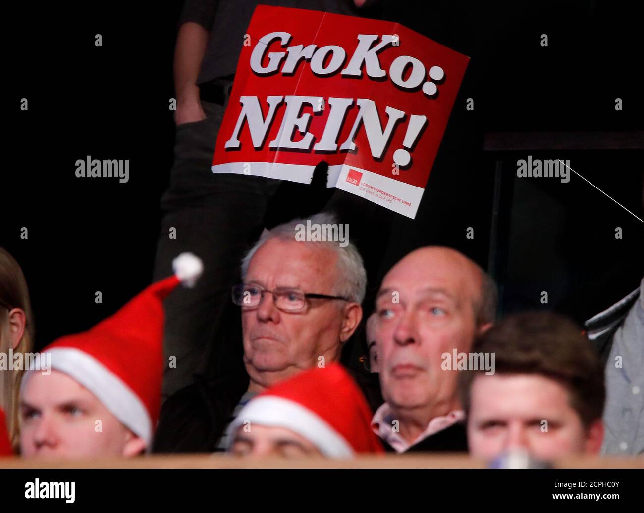 People protest during the SPD's party congress in Bonn, Germany, January 21, 2018. Placard reads 'GroKo: NO' REUTERS/Wolfgang Rattay Stock Photo