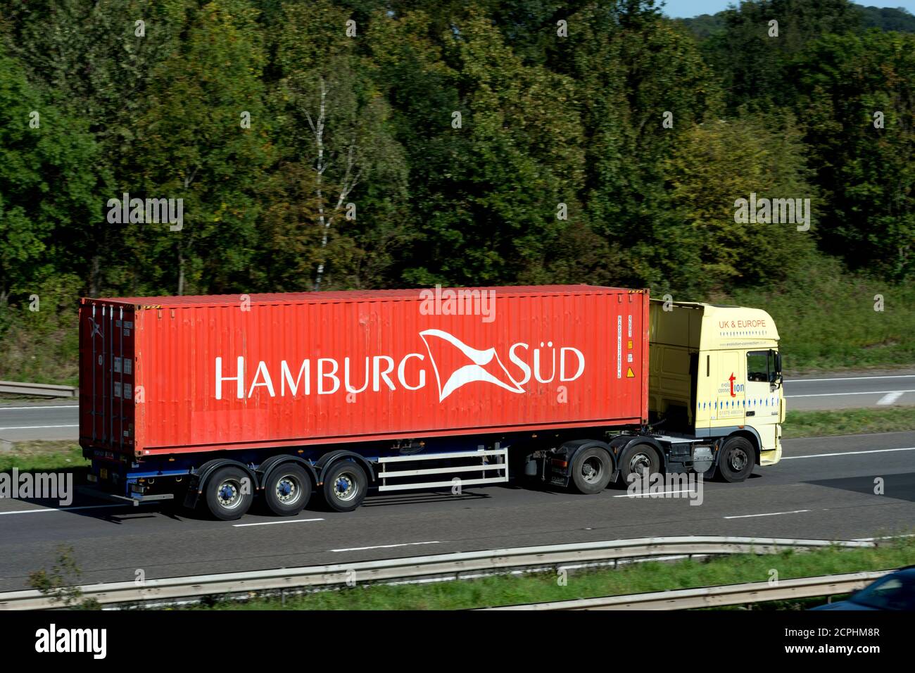 Hamburg Sud shipping container transported on the M40 motorway, Warwickshire, UK Stock Photo