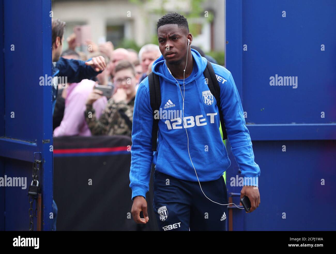 Soccer Football - Premier League - Crystal Palace vs West Bromwich Albion - Selhurst Park, London, Britain - May 13, 2018   West Bromwich Albion's Jonathan Leko arrives at the stadium before the match   REUTERS/Hannah McKay    EDITORIAL USE ONLY. No use with unauthorized audio, video, data, fixture lists, club/league logos or 'live' services. Online in-match use limited to 75 images, no video emulation. No use in betting, games or single club/league/player publications.  Please contact your account representative for further details. Stock Photo