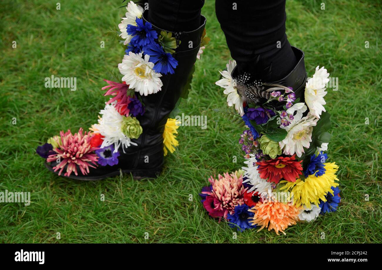 A woman displays her floral decorated boots at the RHS Chelsea Flower Show in London, Britain, May 21, 2018. REUTERS/Toby Melville Stock Photo