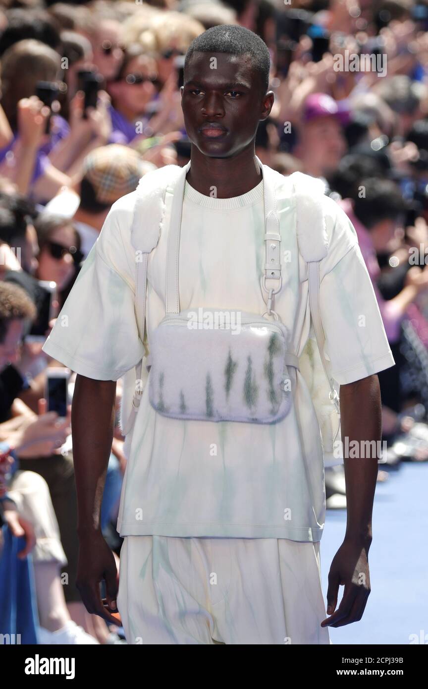 A model presents a creation by designer Virgil Abloh as part of his  Spring/Summer 2019 collection for Louis Vuitton fashion house during Men's  Fashion Week in Paris, France, June 21, 2018. REUTERS/Charles