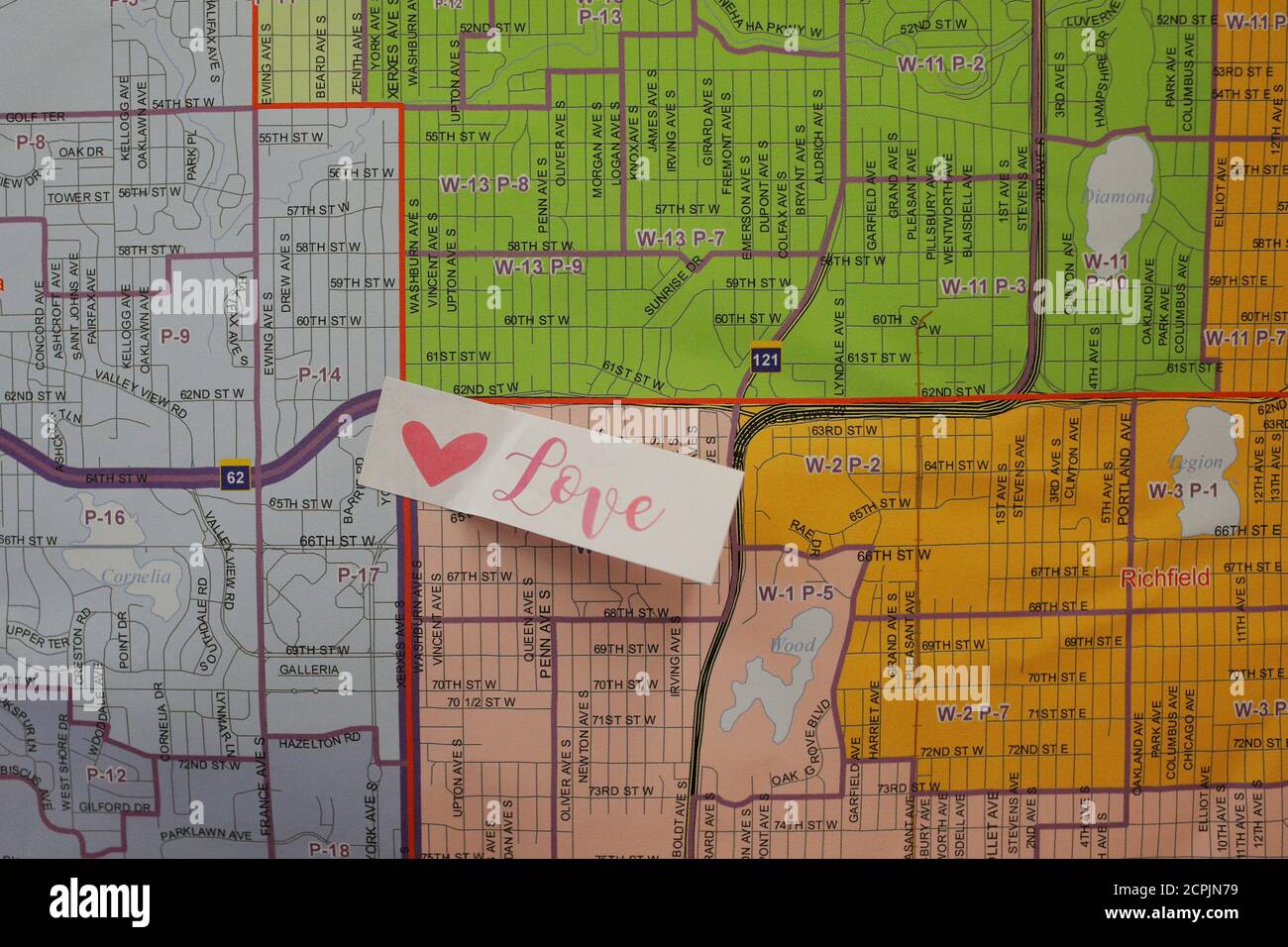 A map of the fifth congressional district is marked with a "LOVE