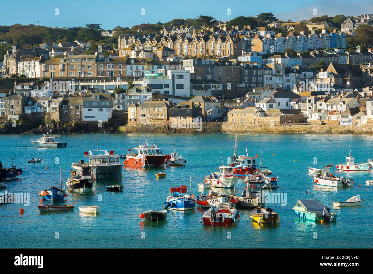 UK England fishing town, view in summer of fishing boats moored in St Ives harbour, Cornwall, south west England, UK Stock Photo