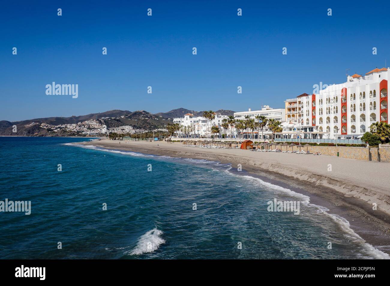 Urban beach in the resort town of Nerja, Malaga Province, Costa del Sol, Andalusia, Spain Stock Photo