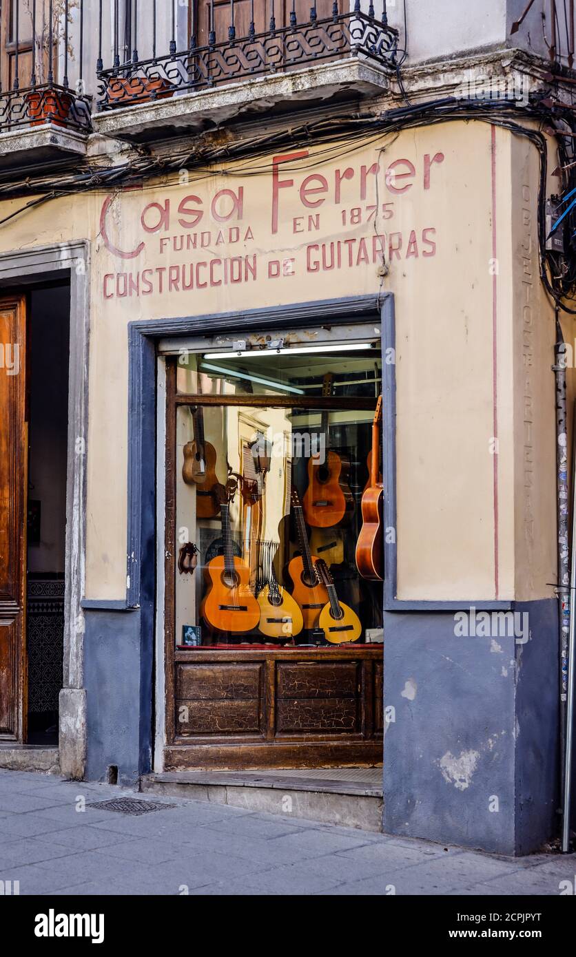Guitar maker in the old town of Granada Andalusia Spain Europe