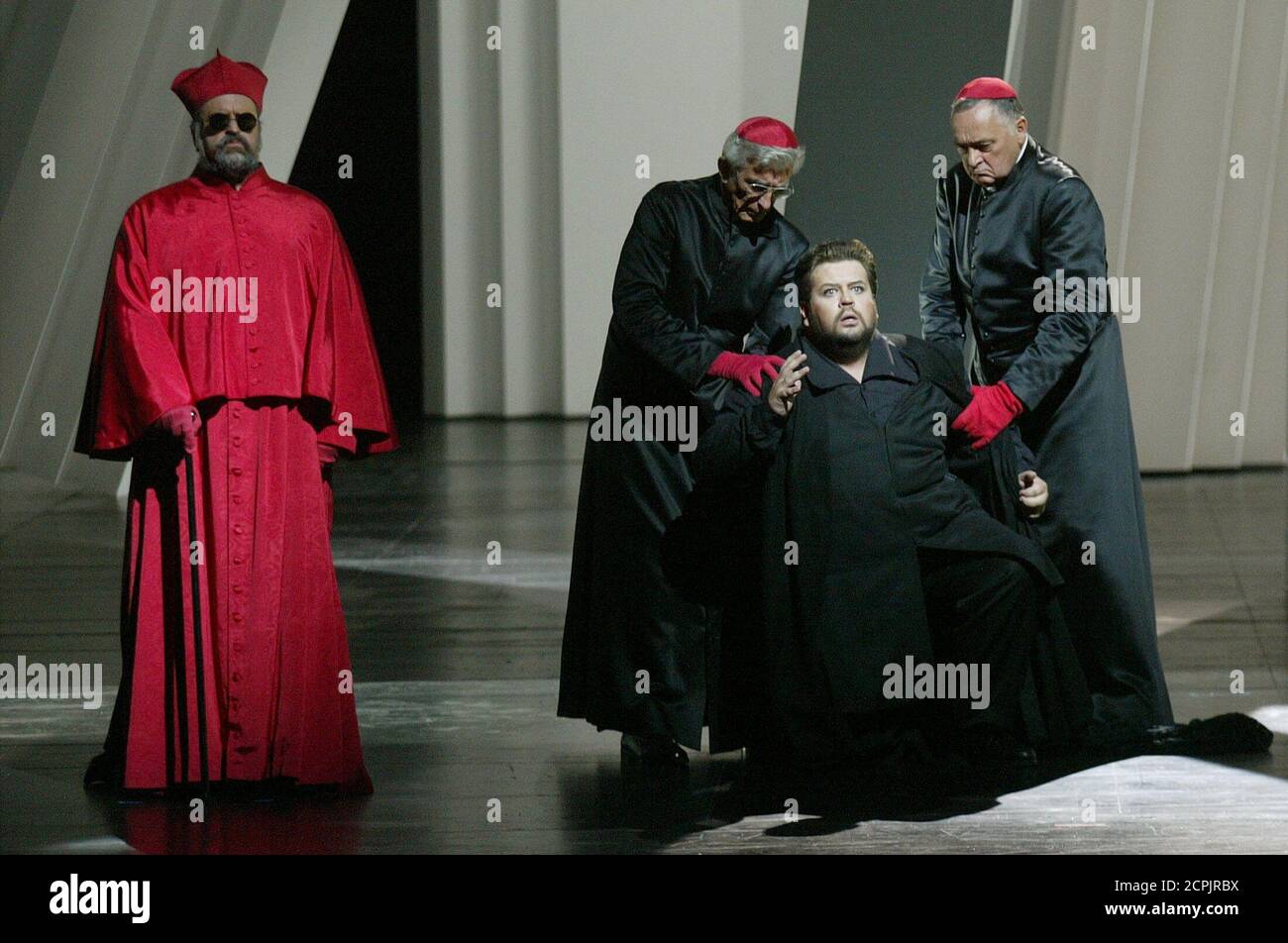 Johan Botha is seen as Don Carlo (R) and Kurt Rydl as Il Grande Inquisitore (L) during a dress rehearsal of Giuseppe Verdi's opera "Don Carlo". Picture taken at the Salzburg Festival July 31, 2003. The world famous cultural Salzburg Festival (Salzburger Festspiele) lasts from Friday July 25 to Sunday August 31 and the play has its premiere night August 2, 2003. REUTERS/Leonhard Foeger REUTERS LF/ Stock Photo