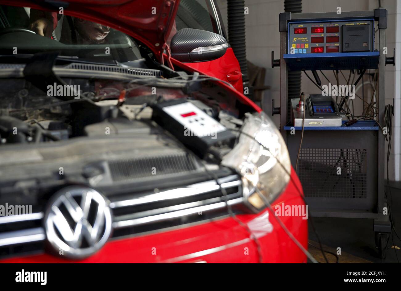 A Volkswagen car is pictured during a test at a technical and testing centre in Zenica, Bosnia and Herzegovina, September 23, 2015. Volkswagen Chief Executive Martin Winterkorn faces a reckoning with his board on Wednesday, summoned to explain the falsification of U.S. emissions tests in the biggest scandal in the 78-year history of the world's largest carmaker. The U.S. Environmental Protection Agency (EPA) said on Friday Volkswagen could face penalties of up to $18 billion for cheating emissions tests on some of its diesel cars. REUTERS/Dado Ruvic Stock Photo