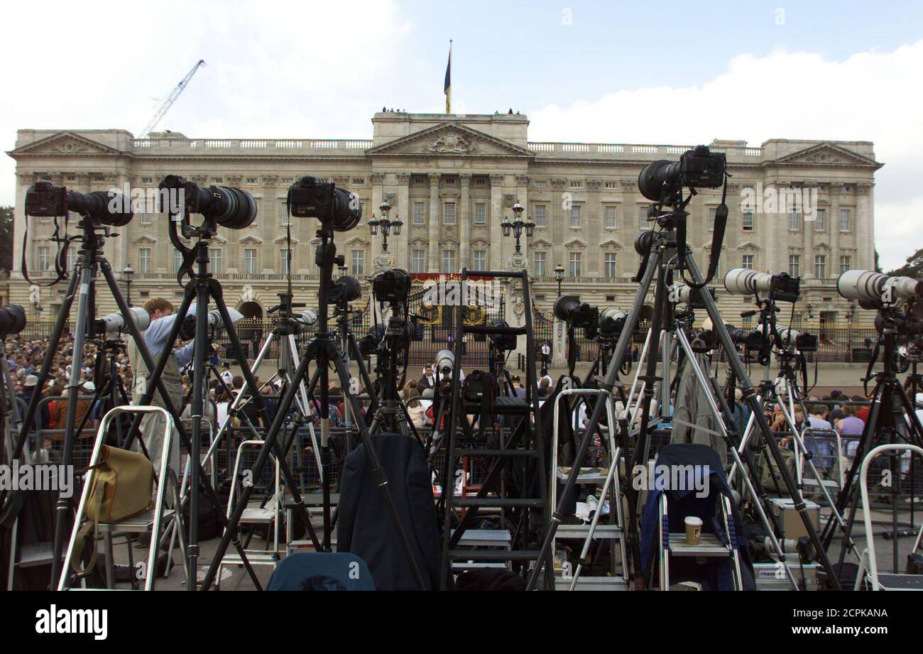 Cameras with long lenses mounted on tripods in a sea of aluminium ladders stand infront of Buckingham Palace prior to the arrival of Queen Elizabeth, the Queen Mother on her 100th birthday August 4, 2000.  RUS/JRE Stock Photo