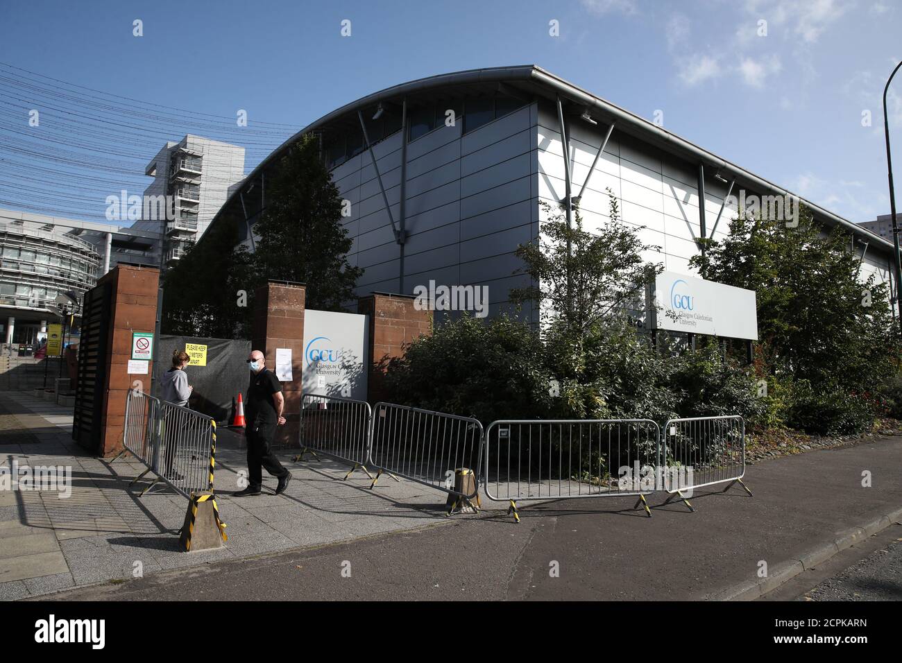 Staff at the entrance to the new walk-through testing centre as at Glasgow Caledonian University's ARC sports centre, in central Glasgow which opened yesterday. Stock Photo