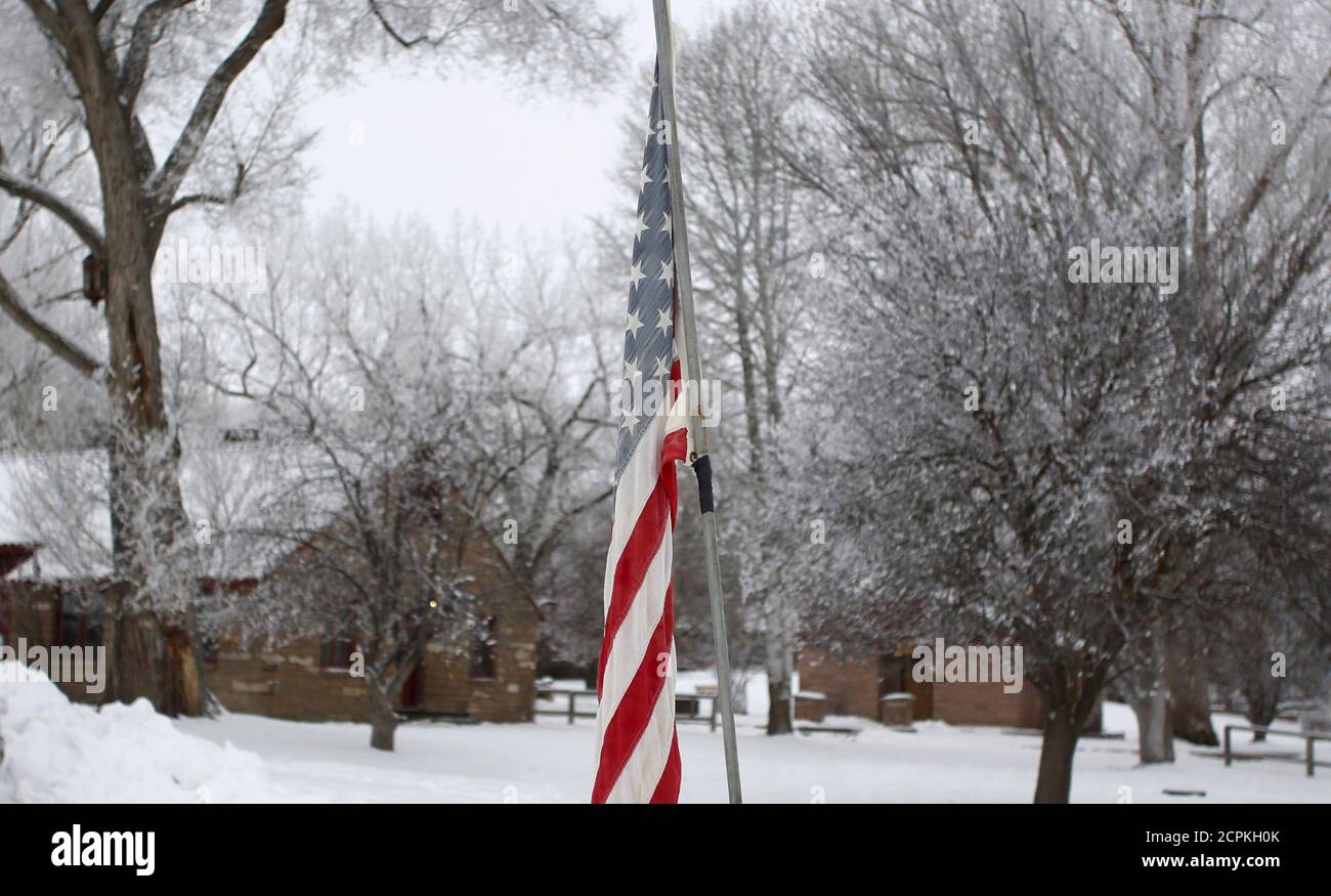 An American flag is seen at the Malheur National Wildlife Refuge near Burns, Oregon, January 10, 2016. Members of self-styled militia groups met on Friday with armed protesters occupying the federal wildlife refuge in Oregon, pledging support for their cause, if not their methods, and offering to act as a peace-keeping force in the week-long standoff over land rights. REUTERS/Jim Urquhart Stock Photo