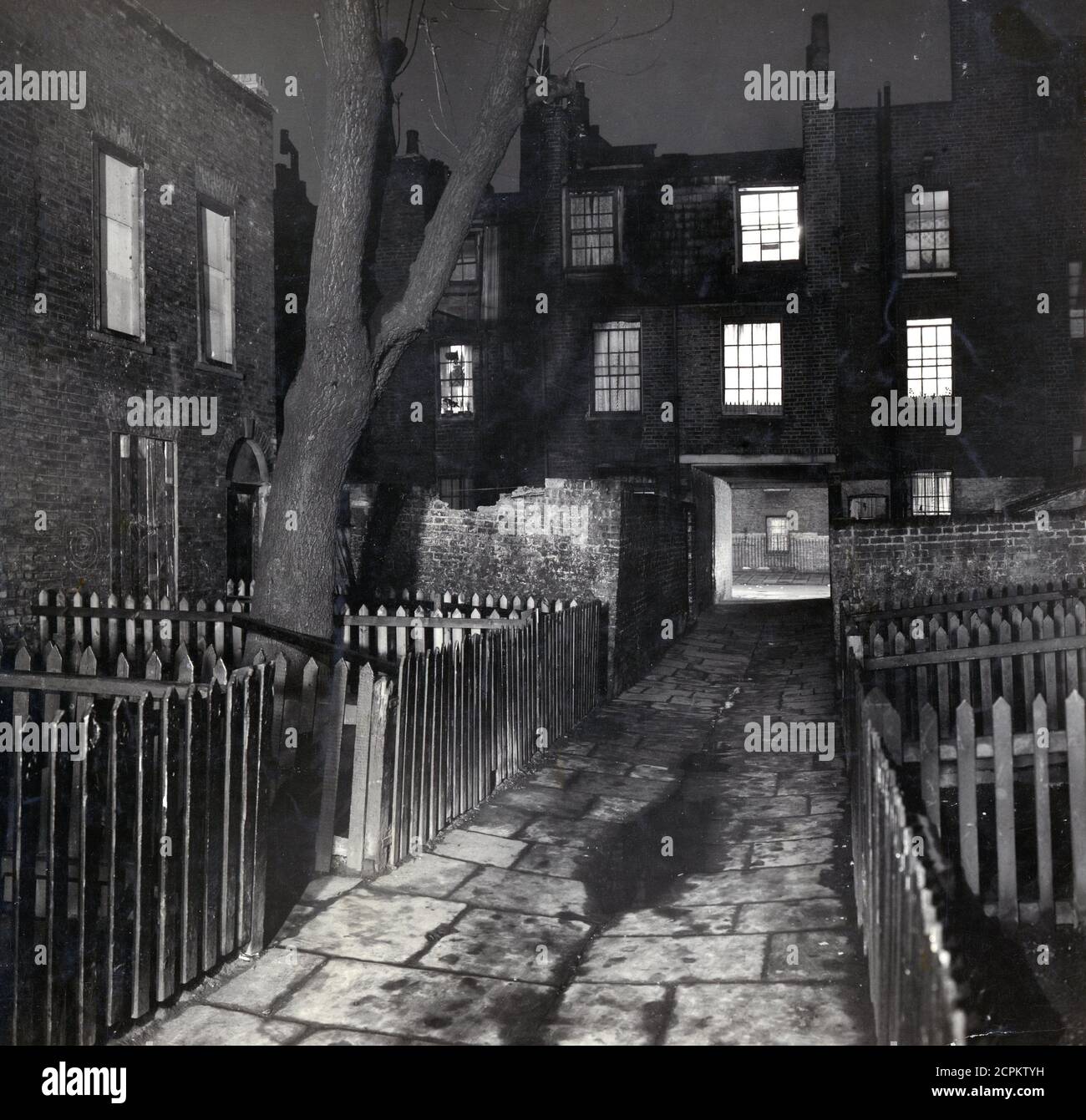 A night time photograph of the back streets of Euston, London. Taken from an original photograph by D Griffin for the London photographers Larkin Brothers Stock Photo