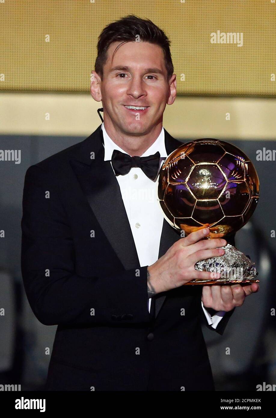 FC Barcelona's Lionel Messi of Argentina holds the World Player of the