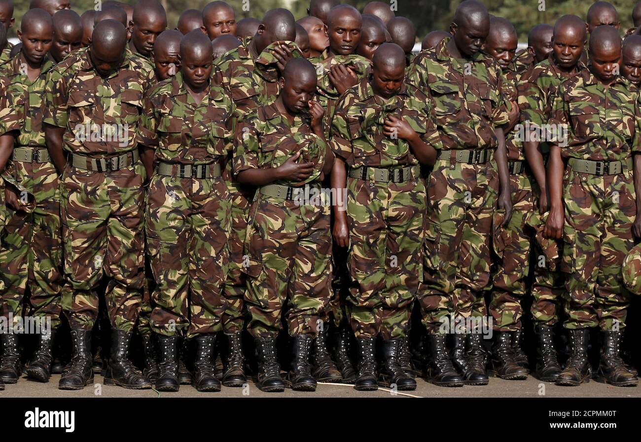 Members of the Kenya Defence Forces attend prayers to pay respects to the Kenyan soldiers serving in the African Union Mission in Somalia (AMISOM), who were killed in El Adde during an attack, at a memorial mass at the Moi Barracks in Eldoret, in this January 27, 2016 file photo. As many as 200 soldiers were killed in an attack on a Kenyan military camp in Somalia by al Shabaab Islamists last month, Somali President Hassan Sheikh Mohamud told a television station, although Kenya rejected the figure. Kenyan authorities have refused to give a death toll following the Jan. 15 raid, which targeted Stock Photo