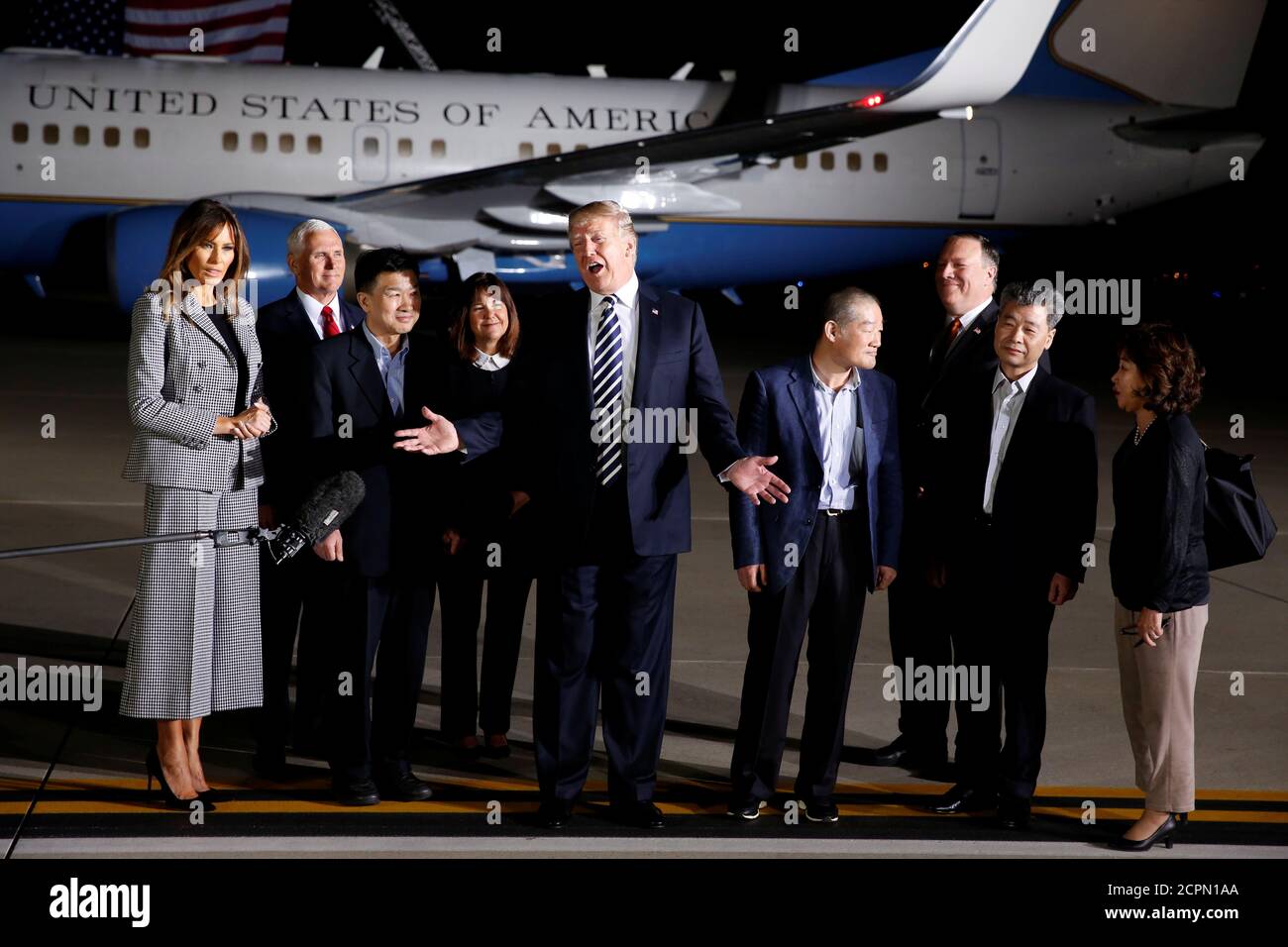 President Donald Trump talks to the media next to the three Americans formerly held hostage in North Korea, Tony Kim, Kim Hak-song and Kim Dong-chul, upon their arrival at Joint Base Andrews, Maryland, U.S., May 10, 2018. REUTERS/Joshua Roberts Stock Photo