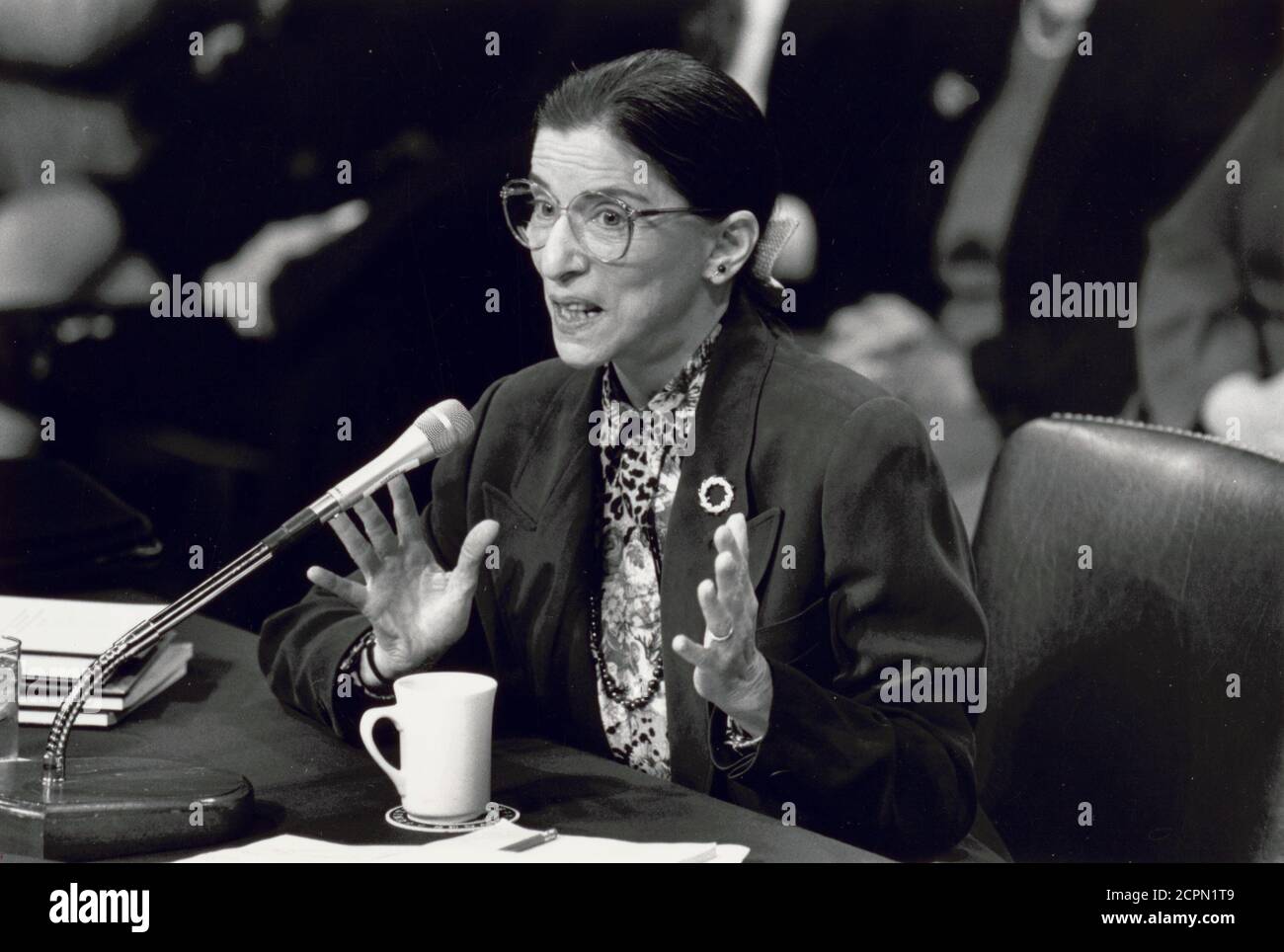 Ruth Bader Ginsburg speaking into microphone before the United States Senate Judiciary Committee hearing for her appointment to the Supreme Court, Washington, DC, 7/20/1993. (Photo by Michael R Jenkins/Congressional Quarterly/RBM Vintage Images) Stock Photo