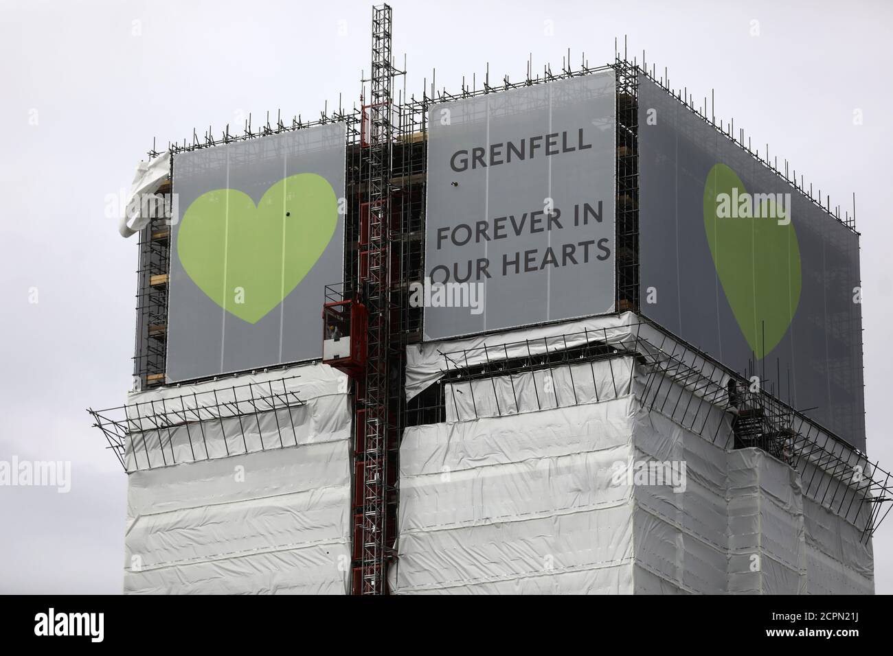 New hoarding covers the top of Grenfell Tower to mark the first anniversary of the fire that killed 71 people at the social housing tower block in west London, June 8, 2018. REUTERS/Simon Dawson Stock Photo
