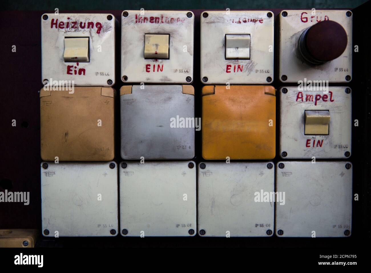 A picture shows a panel of switches inside Christoph Zwiener's exhibition project 'ADN Guard House' in Berlin May 22, 2014. A German artist has turned a tiny surveillance booth used by the communist regime in the former East Germany to monitor citizens into an art exhibit and venue, which will be installed in a museum near Los Angeles dedicated to the Cold War. The one-person guardhouse measuring 2 m by 1 m (2 yards by 1 yard) was originally located in the parking lot of state-run news agency ADN so that authorities could keep a watchful eye on reporters. Artist Christof Zwiener rescued it fro Stock Photo