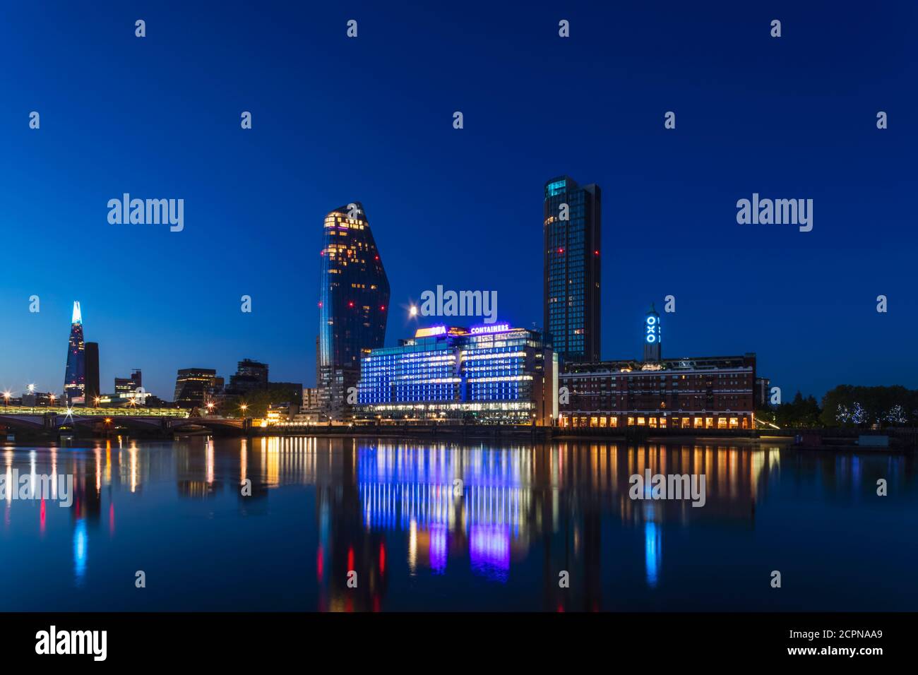 England, London, Southwark, Bankside Skyline and River Thames at Night Stock Photo