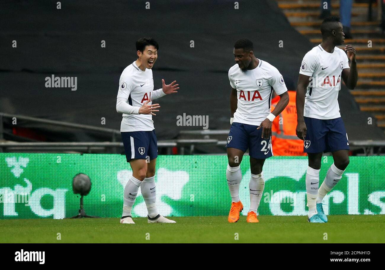 Soccer Football - Premier League - Tottenham Hotspur vs Huddersfield Town - Wembley Stadium, London, Britain - March 3, 2018   Tottenham's Son Heung-min celebrates scoring their first goal with Serge Aurier and Davinson Sanchez   REUTERS/Eddie Keogh    EDITORIAL USE ONLY. No use with unauthorized audio, video, data, fixture lists, club/league logos or 'live' services. Online in-match use limited to 75 images, no video emulation. No use in betting, games or single club/league/player publications.  Please contact your account representative for further details. Stock Photo