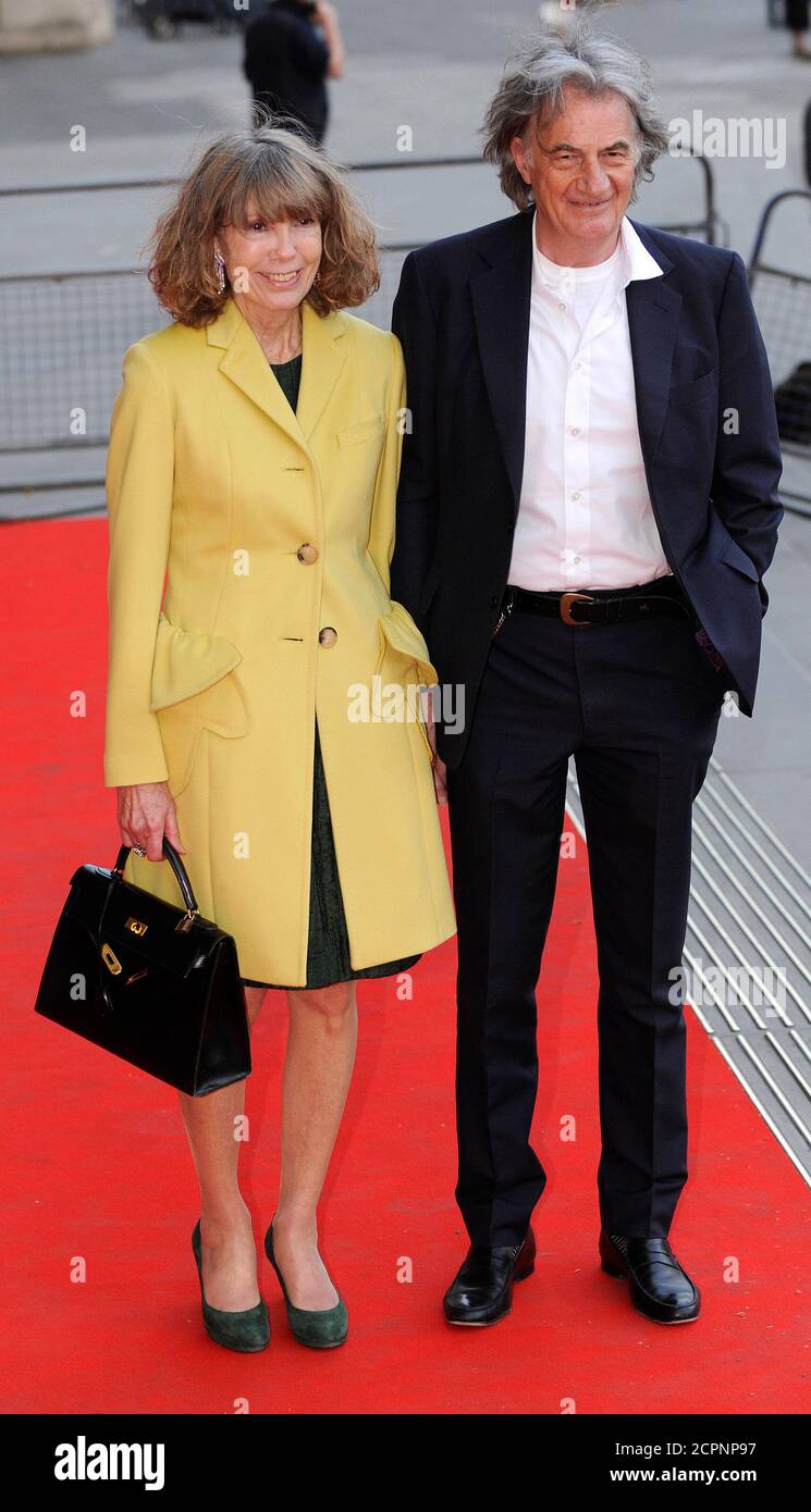 British fashion designer Paul Smith and his wife Pauline arrive for the  private viewing of the Grace Kelly exhibition at the Victoria and Albert  Museum in London April 15, 2010. REUTERS/Toby Melville (