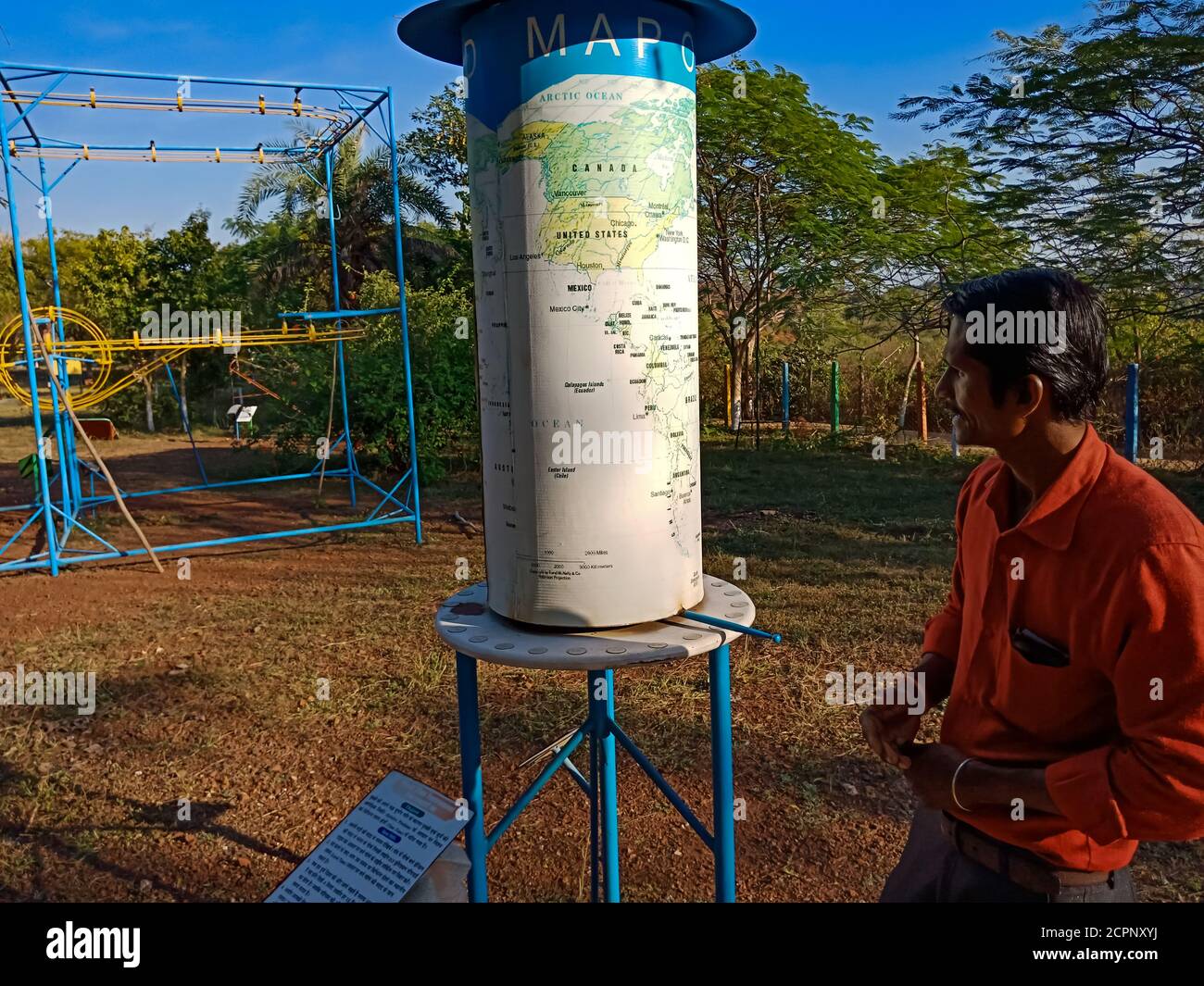 DISTRICT KATNI, INDIA - JANUARY 23, 2020: iron material made world time science model presentation on garden area, education program by Asian countrie Stock Photo