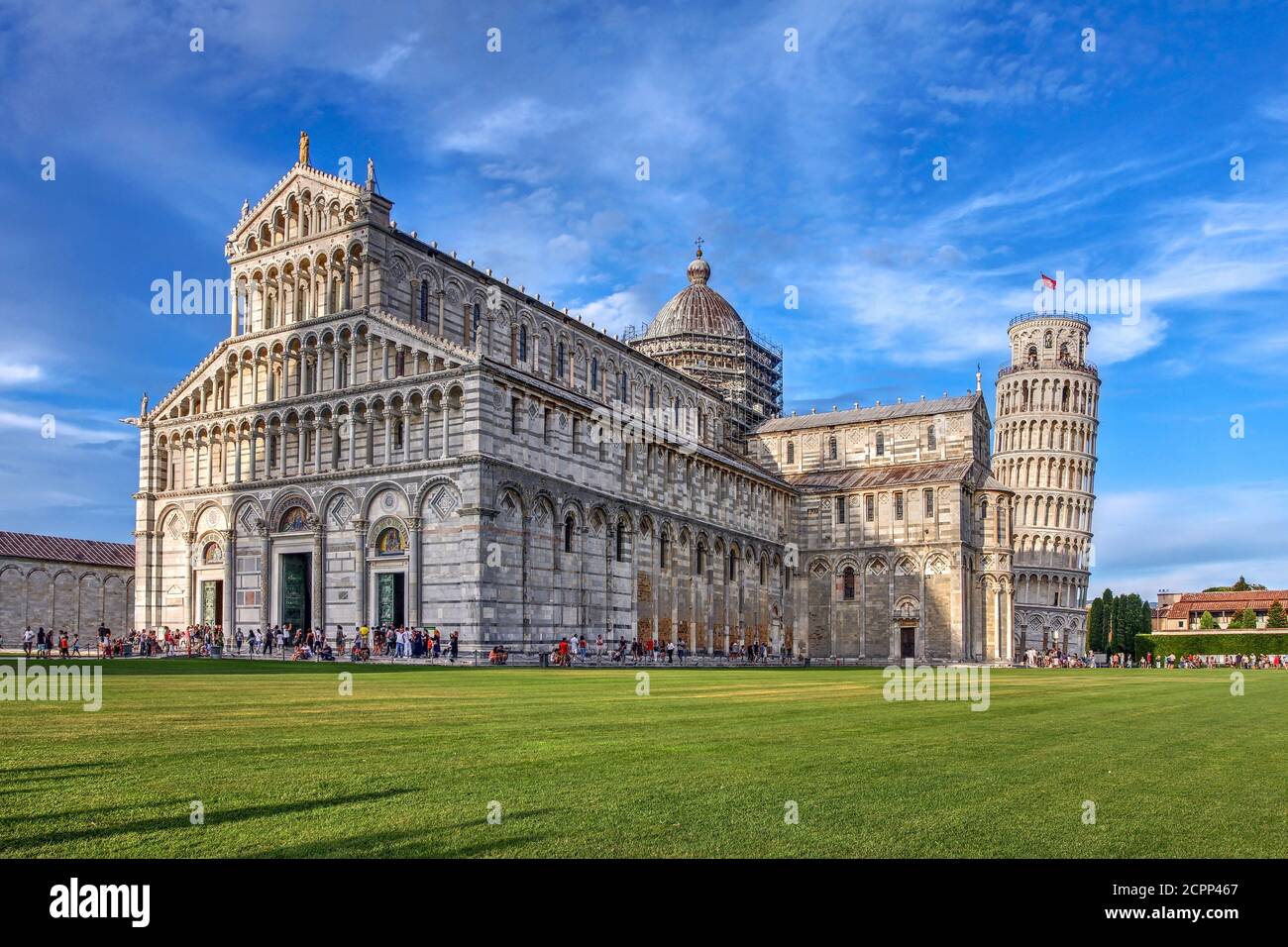 Evening scene in Pisa, Tuscany, Italy with the Duomo and the Leaning Tower in Campo dei Miracoli. Stock Photo