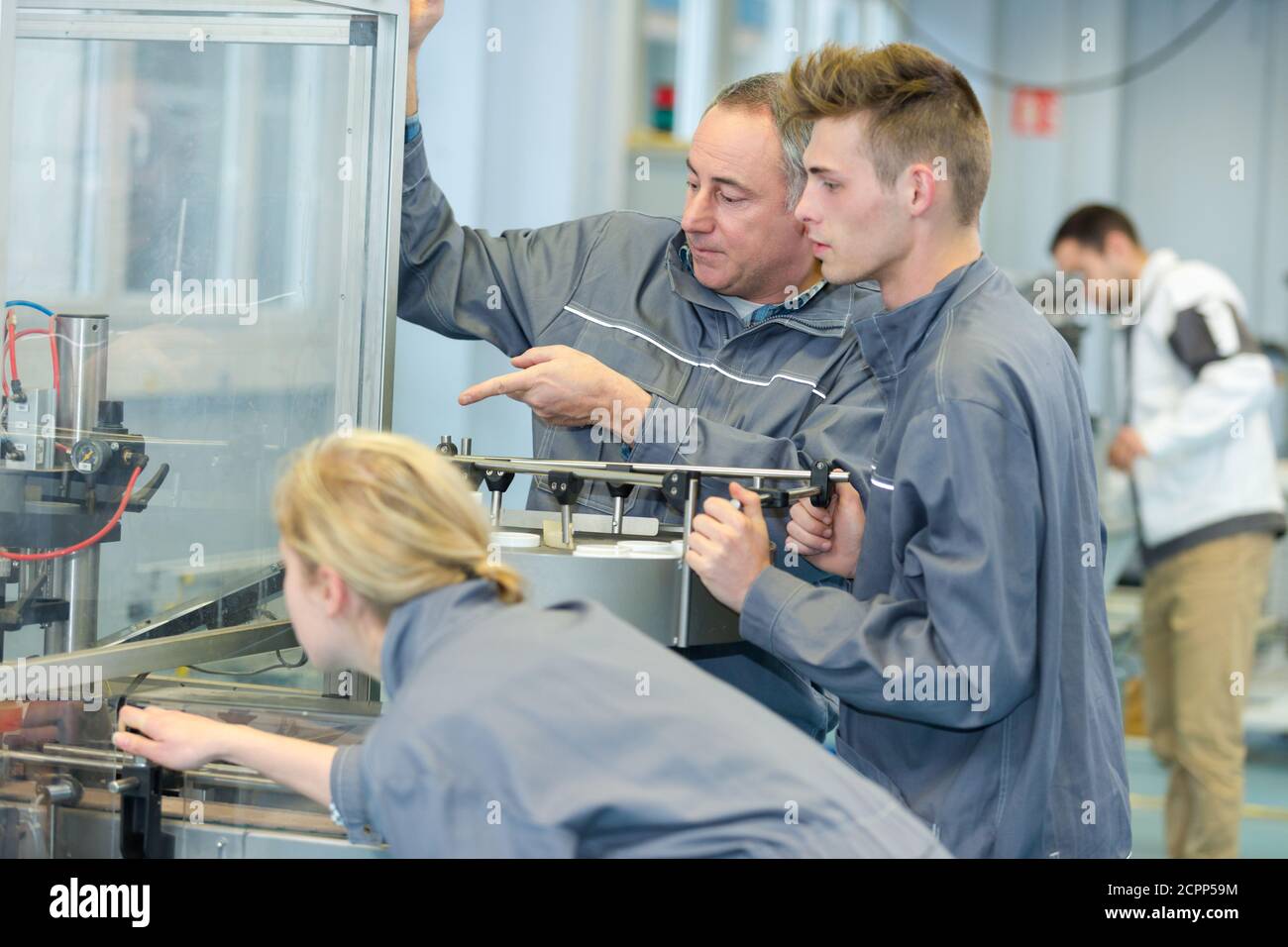 factory manager and engineering apprentice Stock Photo