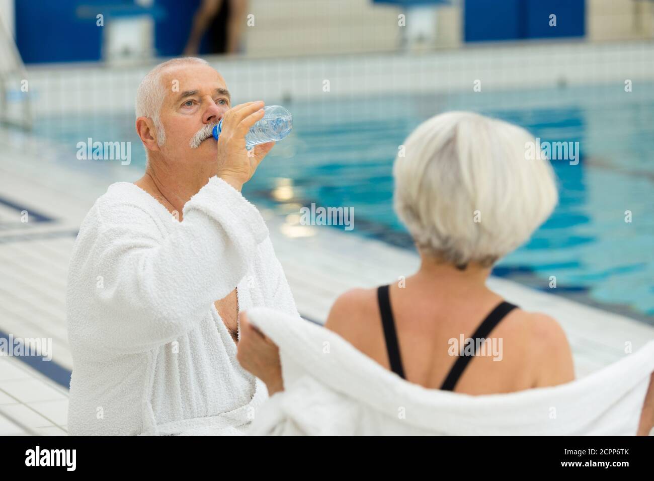 senior happy couple in swimming pool Stock Photo - Alamy