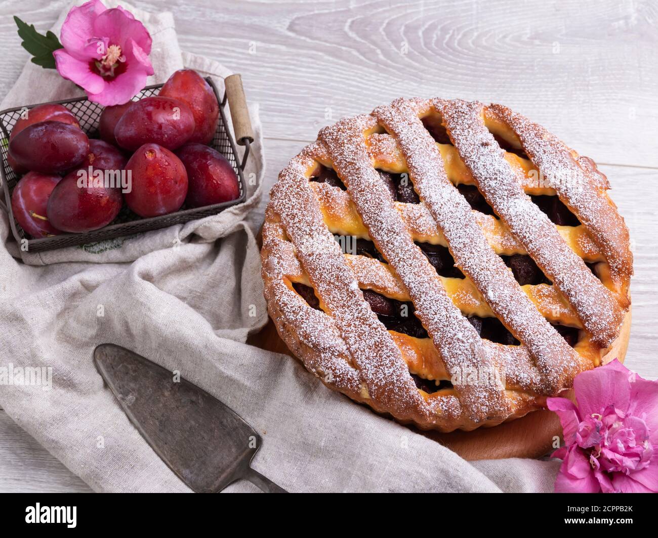 Yummy  delicious homemade pie cake with plum, close up Stock Photo