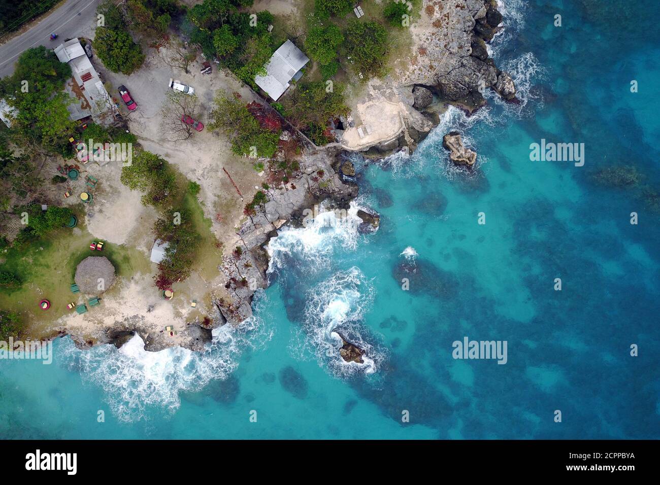 Drone aerial image of 3 Dives Point on the western coast of Jamaica near Negril. Stock Photo
