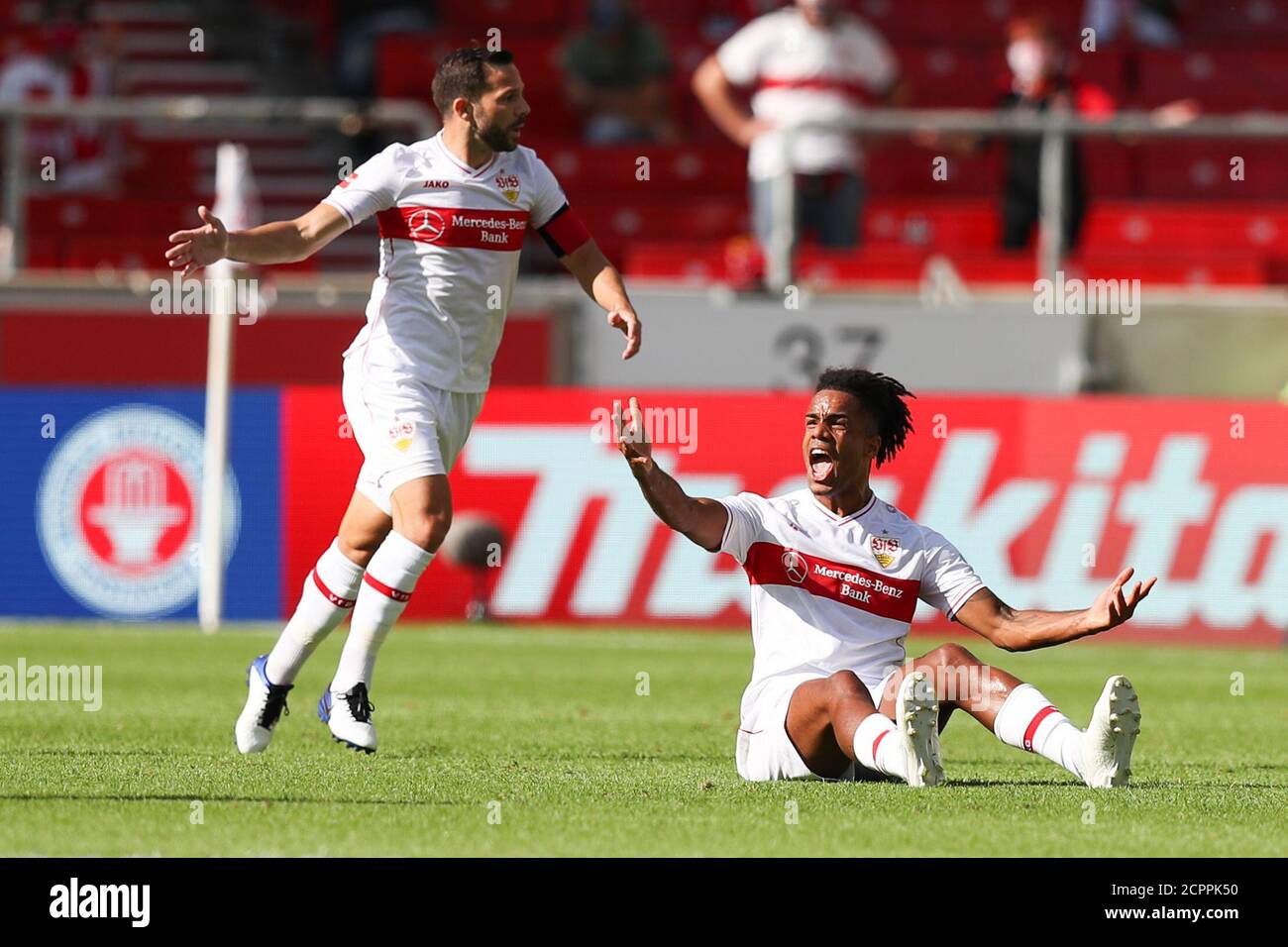 Stuttgart, Germany. 19th Sep, 2020. Football: Bundesliga, VfB Stuttgart - SC Freiburg, 1st matchday, Mercedes-Benz Arena. Stuttgart's Gonzalo Castro (l) and Stuttgart's Daniel Didavi (r) react in the match. Credit: Tom Weller/dpa - IMPORTANT NOTE: In accordance with the regulations of the DFL Deutsche Fußball Liga and the DFB Deutscher Fußball-Bund, it is prohibited to exploit or have exploited in the stadium and/or from the game taken photographs in the form of sequence images and/or video-like photo series./dpa/Alamy Live News Stock Photo
