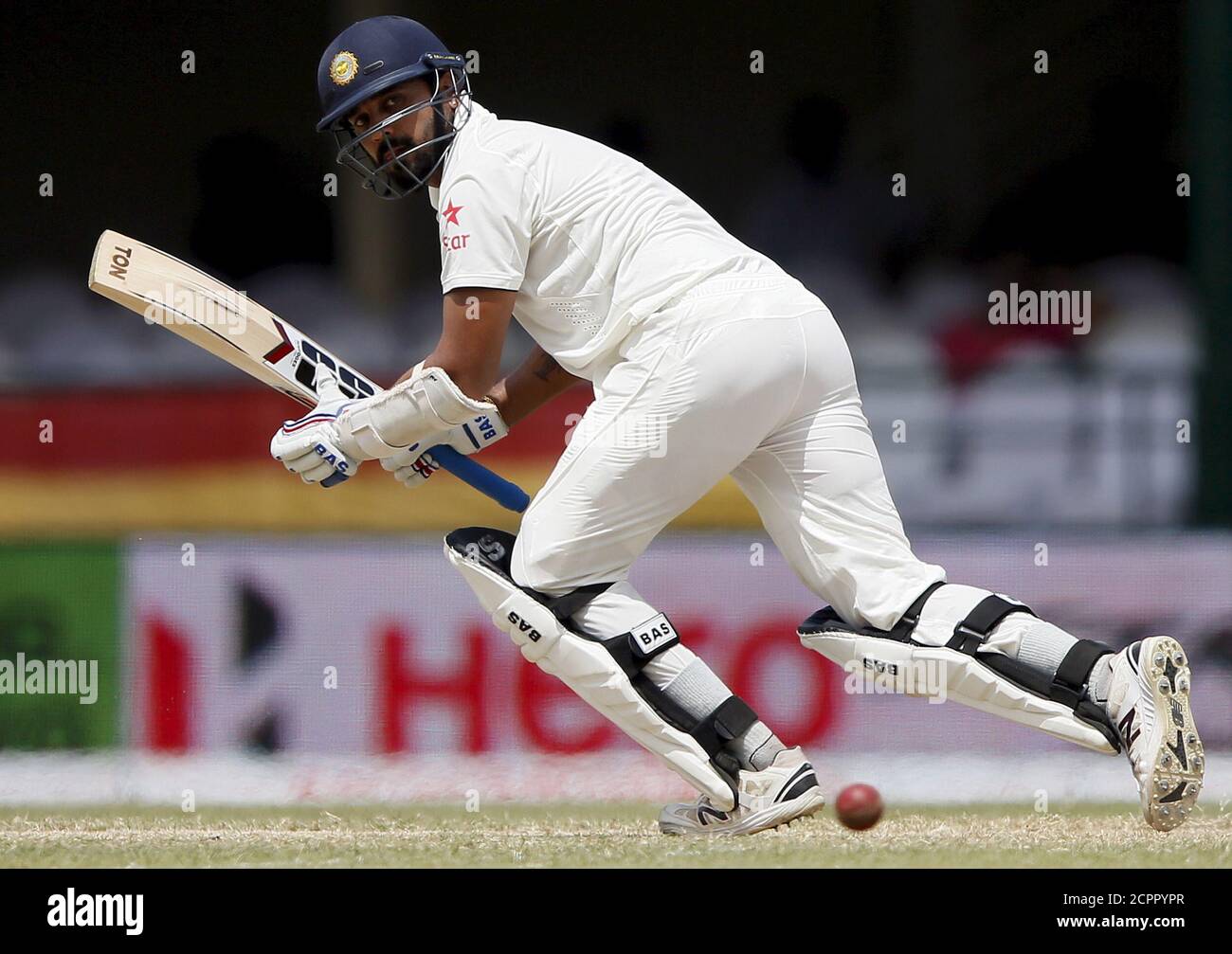 India's Murali Vijay hits a boundary during the fourth day of their second test cricket match against Sri Lanka in Colombo August 23, 2015. REUTERS/Dinuka Liyanawatte Stock Photo