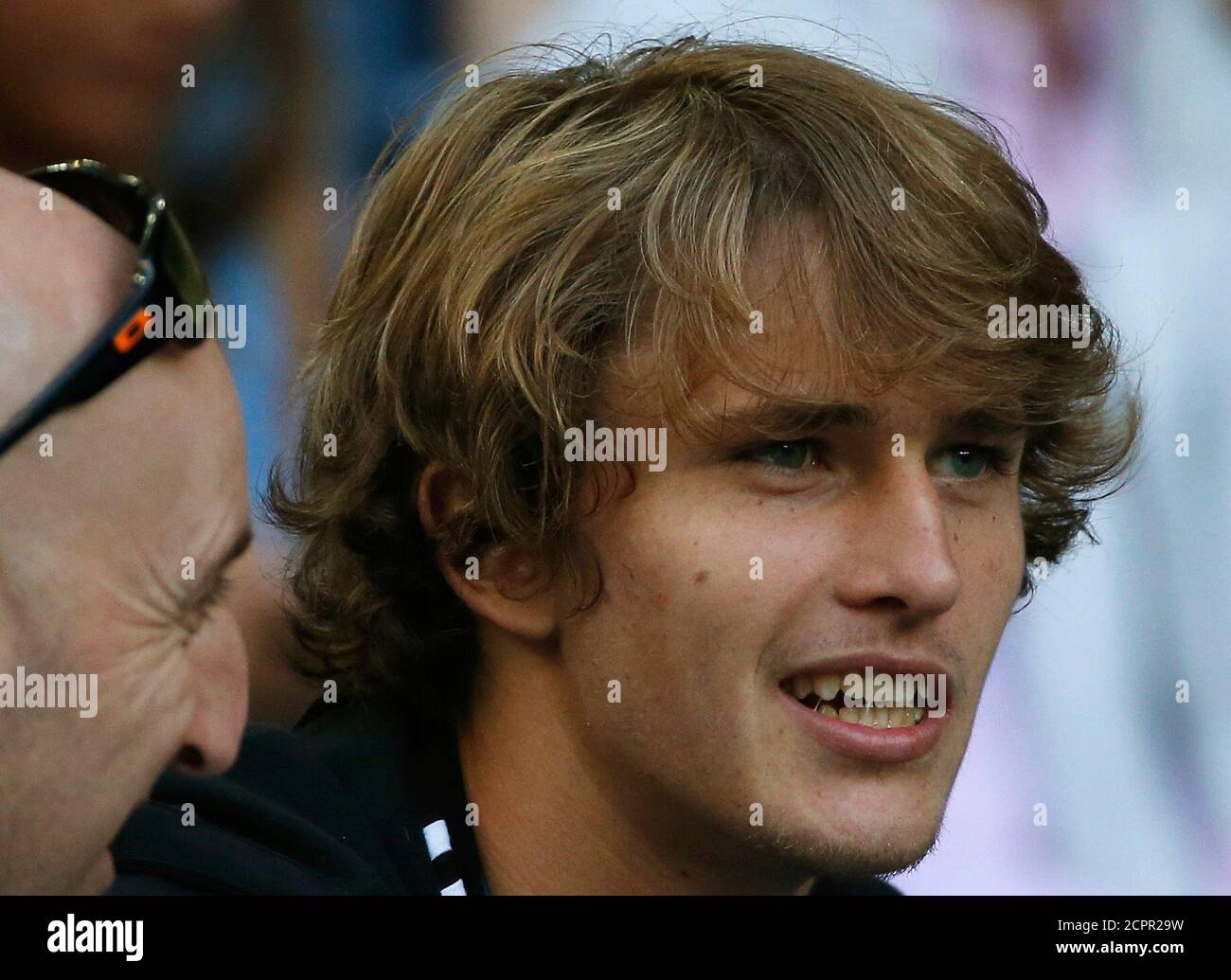 Tennis Australian Open Melbourne Park Melbourne Australia 24 1 17 Germany S Alexander Zverev Brother Of Germany S Mischa Zverev Attends His Brother S Men S Singles Quarter Final Match Against Switzerland S Roger Federer Reuters Issei Kato