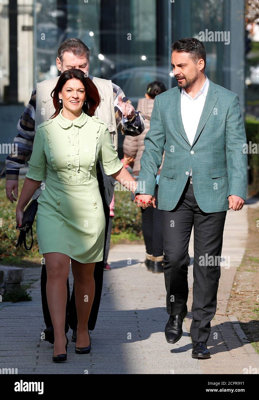 Jobbik party leader Gabor Vona, main opponent to current Prime Minister  Viktor Orban, and his wife Krisztina Vona-Szabo, arrive at a polling  station during Hungarian parliamentary election in Gyongyos, Hungary, April  8,