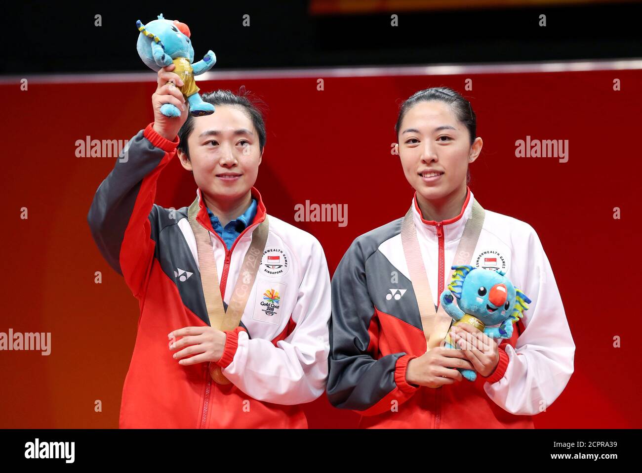 Table Tennis - Gold Coast 2018 Commonwealth Games - Women's Doubles Gold Medal  Medal Ceremony - Oxenford Studios - Gold Coast, Australia - April 13, 2018  - Gold medalists Tianwei Feng and