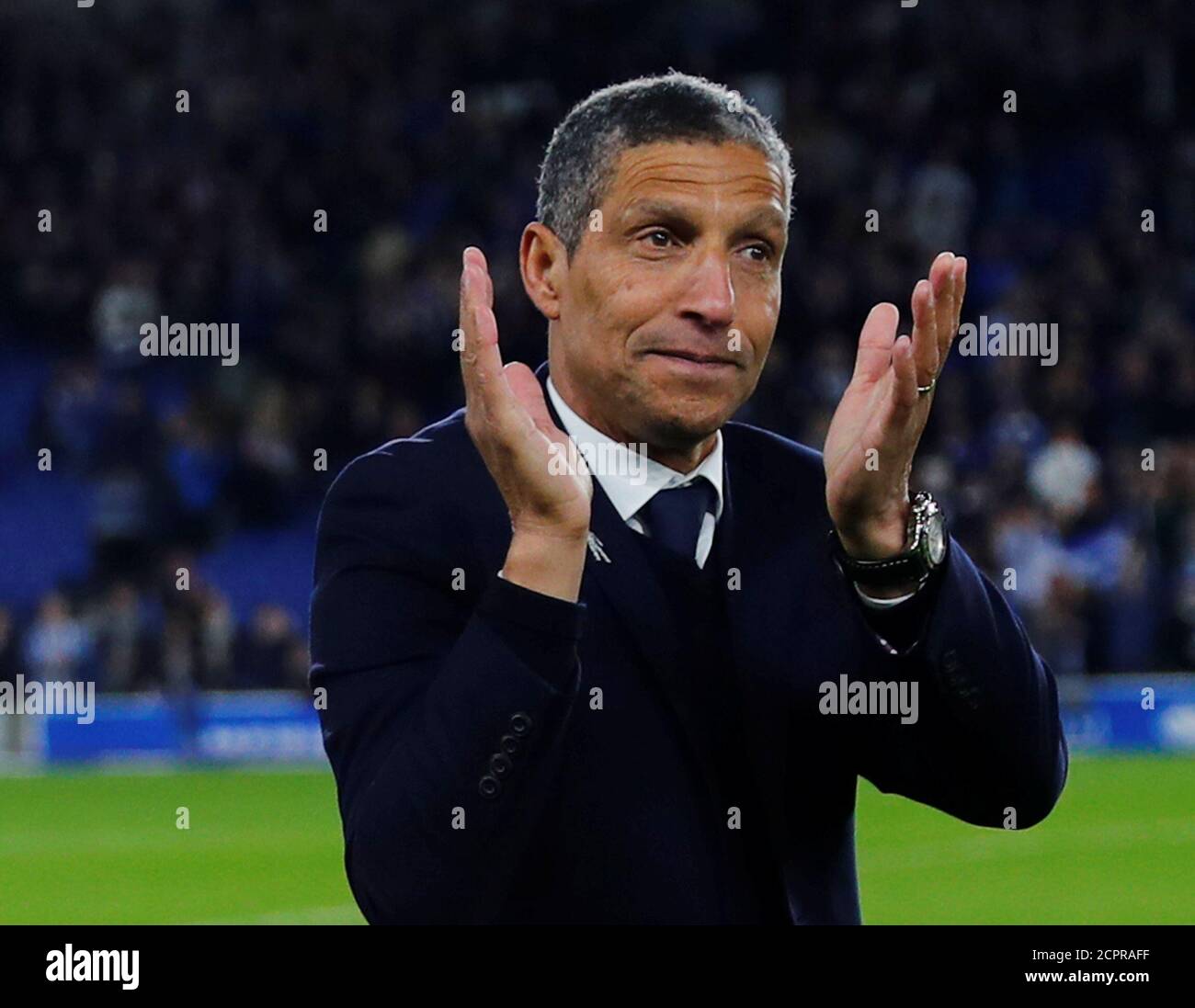 Soccer Football - Premier League - Brighton & Hove Albion v Manchester United - The American Express Community Stadium, Brighton, Britain - May 4, 2018 Brighton manager Chris Hughton during a lap of appreciation after the match REUTERS/Eddie Keogh EDITORIAL USE ONLY. No use with unauthorized audio, video, data, fixture lists, club/league logos or "live" services. Online in-match use limited to 75 images, no video emulation. No use in betting, games or single club/league/player publications. Please contact your account representative for further details. Stock Photo