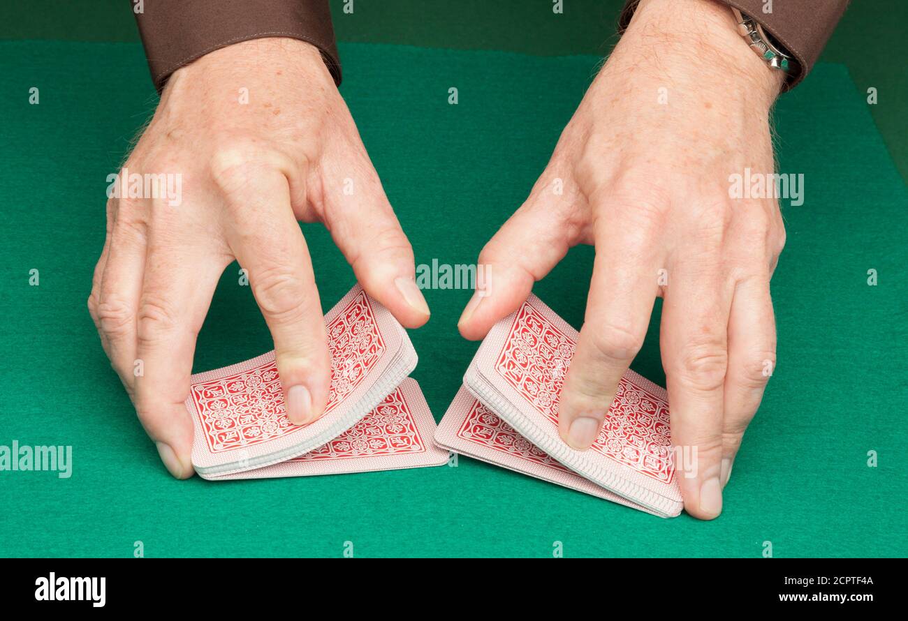 Shuffling a deck of cards hi-res stock photography and images - Alamy