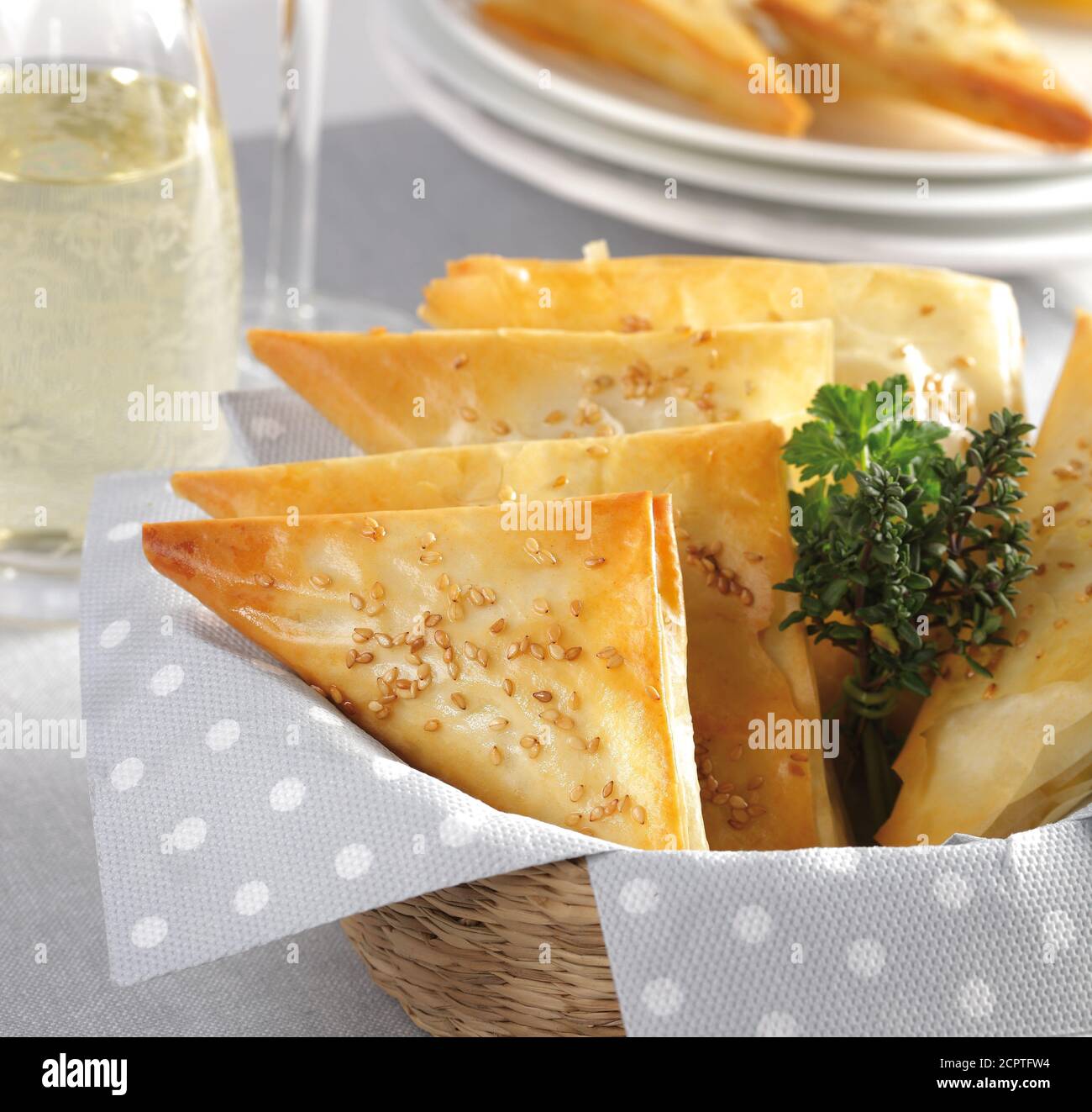 Greek pastry triangles with feta cheese Stock Photo Alamy