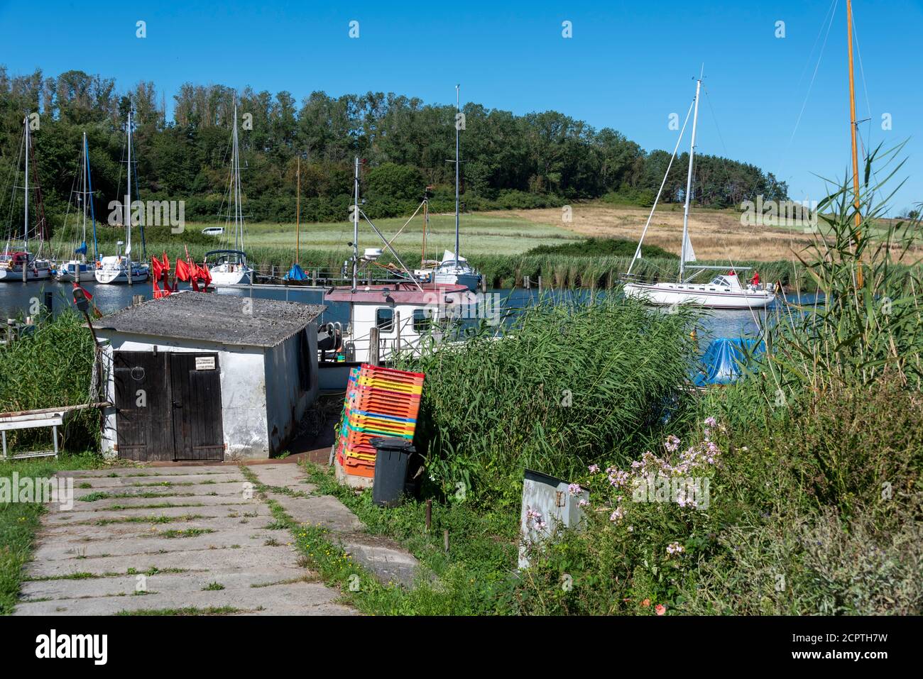Germany, Mecklenburg-Western Pomerania, Ruegen Island, Seedorf, old fisherman's garage, fishing boat, sailing boats Stock Photo