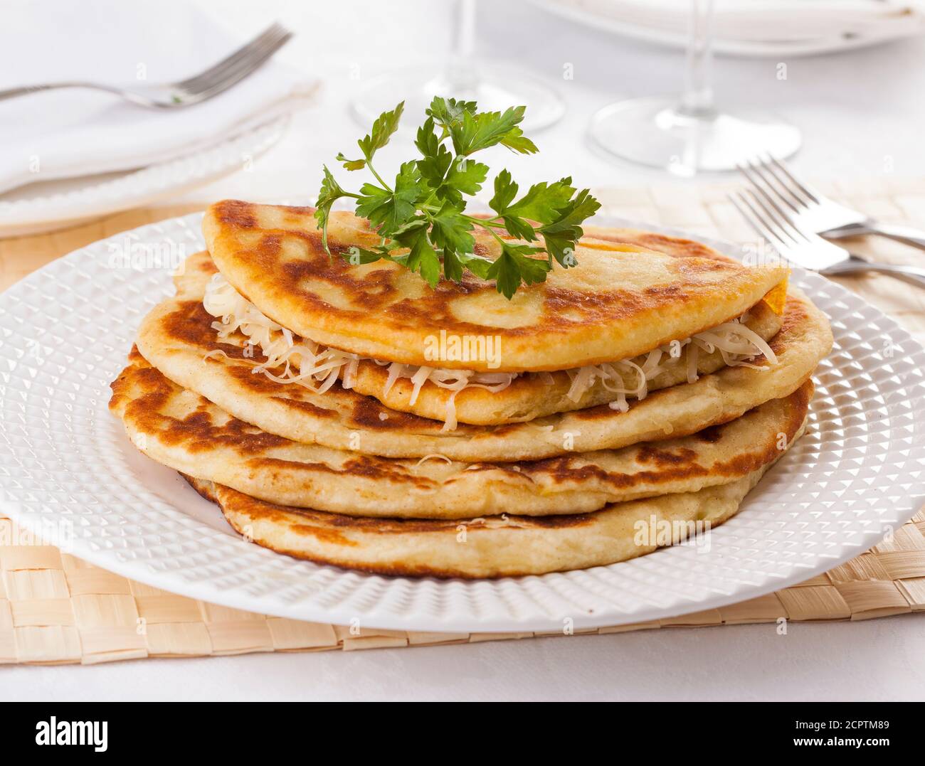 Langos, traditional Hungarian pancake with cheese Stock Photo