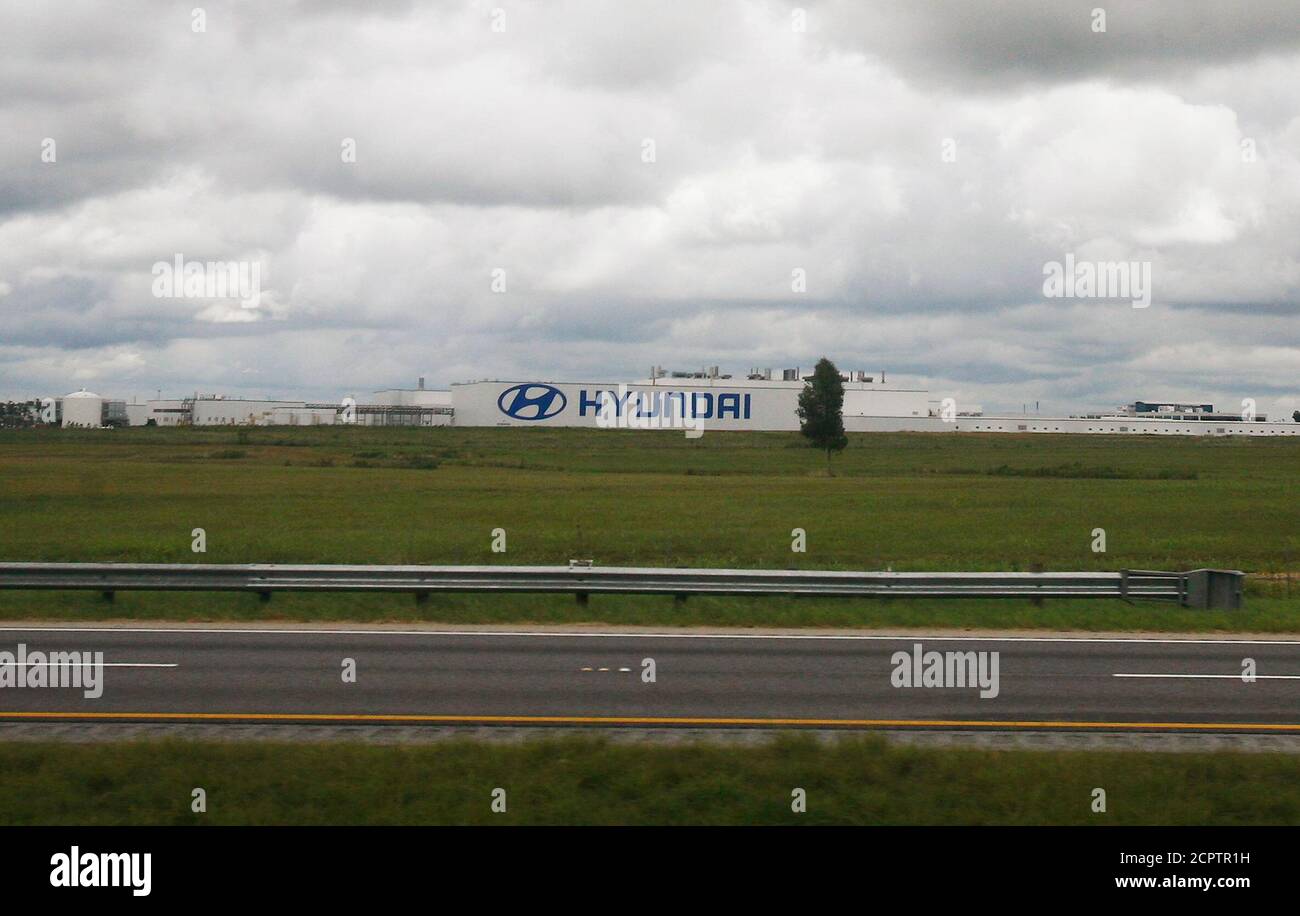 A Hyundai auto plant is seen from inside a Greyhound bus outside of Montgomery, Alabama, August